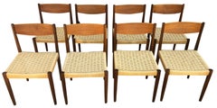 8 chaises à manger danoises du milieu du siècle en teck avec cordon de papier:: Poul Volther