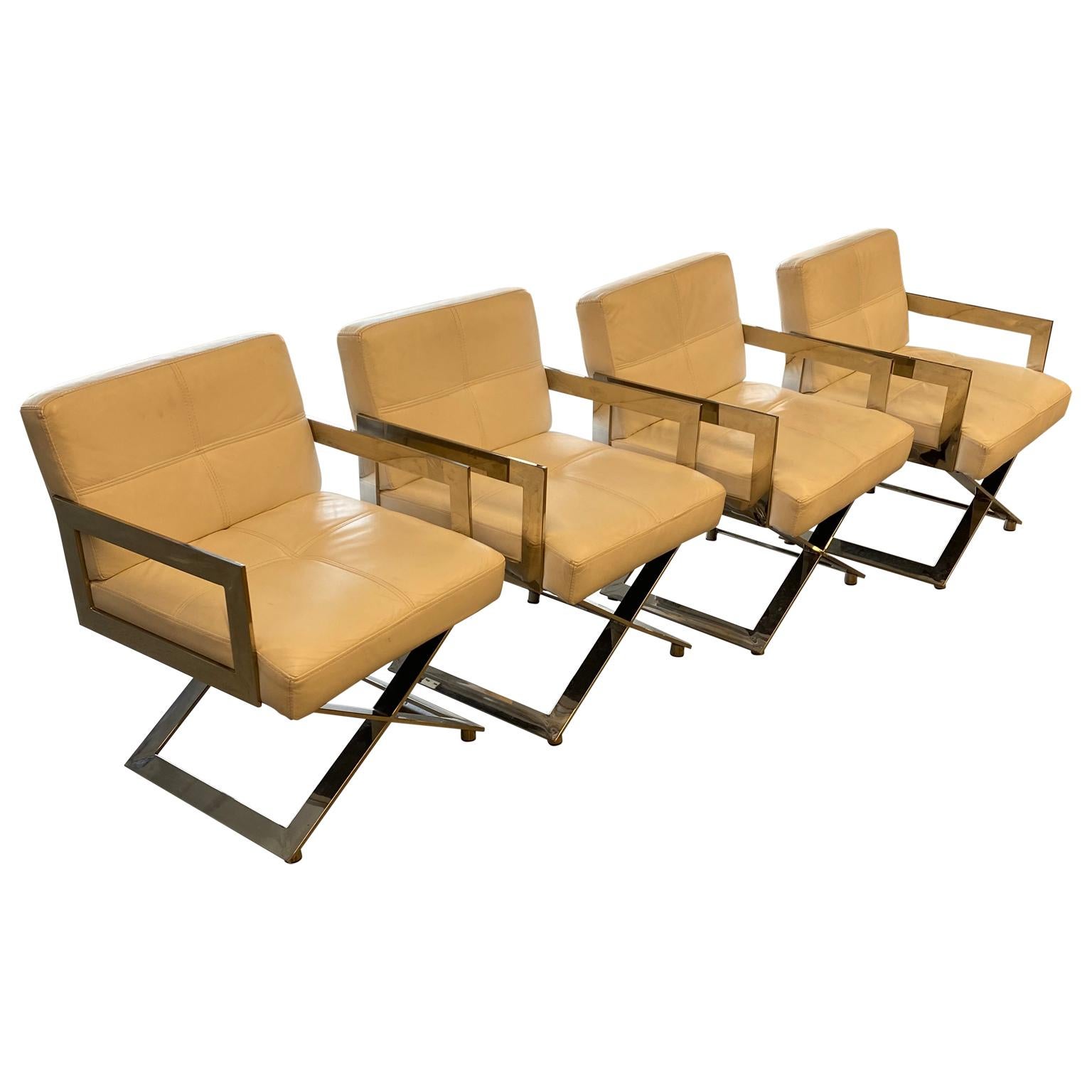 Set of eight Mid-Century Modern Chrome Dining Room Armchairs By Milo Baughman

The chairs are made in polished chrome and white faux leather fabric.
