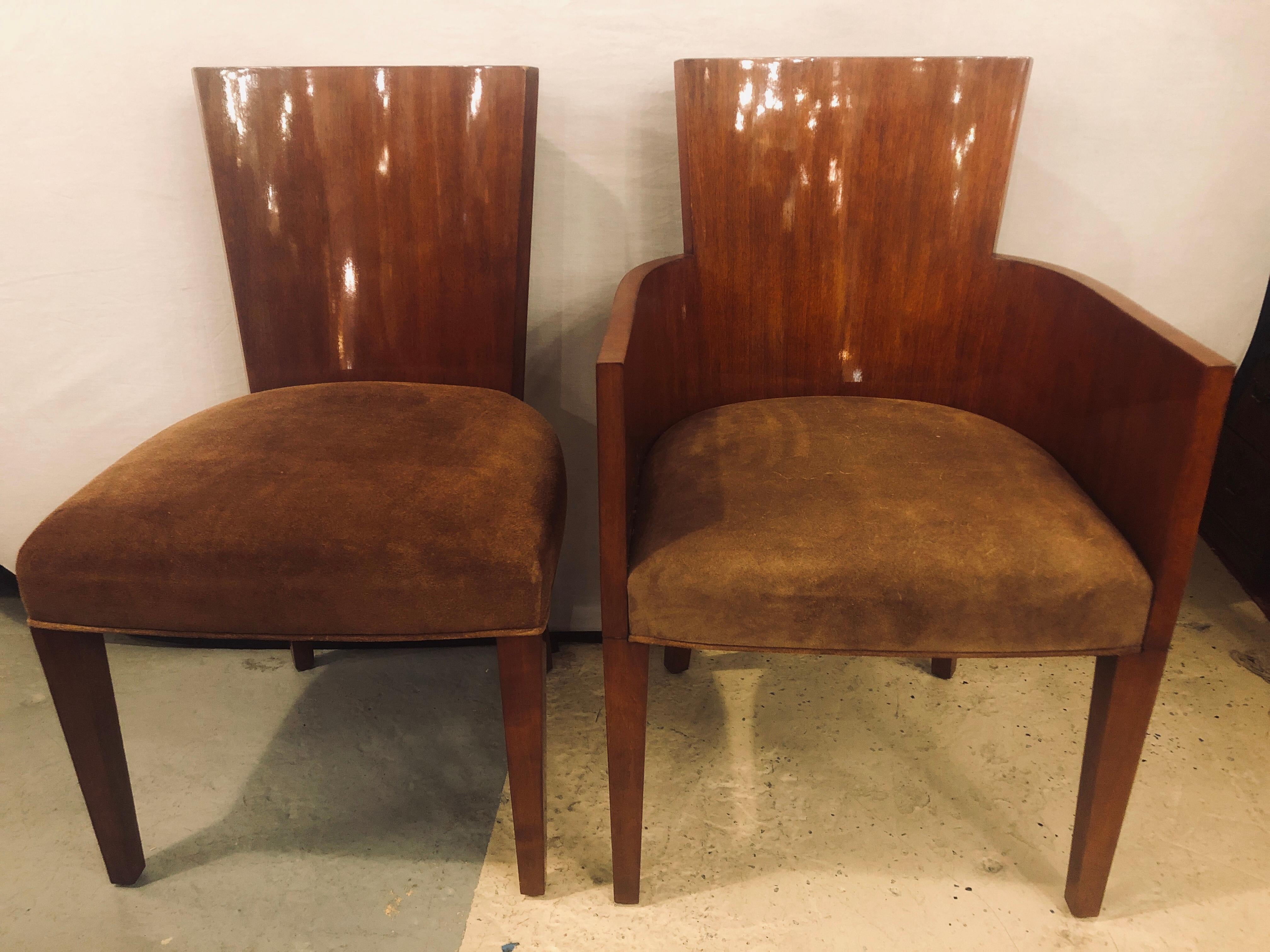 Set of eight mahogany Ralph Lauren dining chairs from the Modern Hollywood collection with suede seats 6 side 2 arm. The measurements listed are for the side chairs. The armchairs measure 34.75 inches height, 22 inches width, 22.5 inches depth.