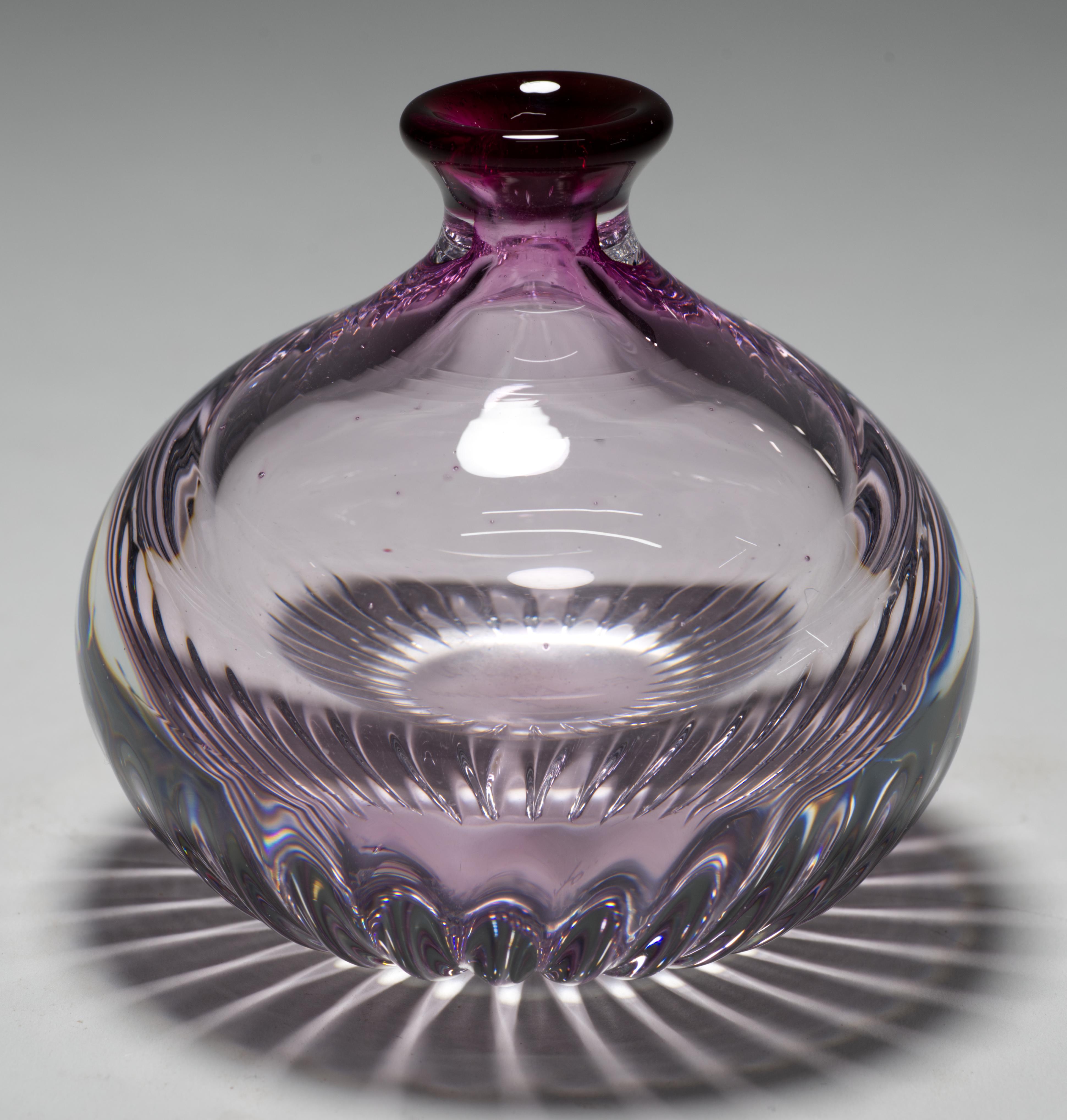 Vintage sommerso bud vase features pink glass core that is encased in clear glass in sommerso technique. Pink glass is used with a pronounced gradation from the deepest pink, almost cranberry red, at the rim, fading in ombre manner to light pink on