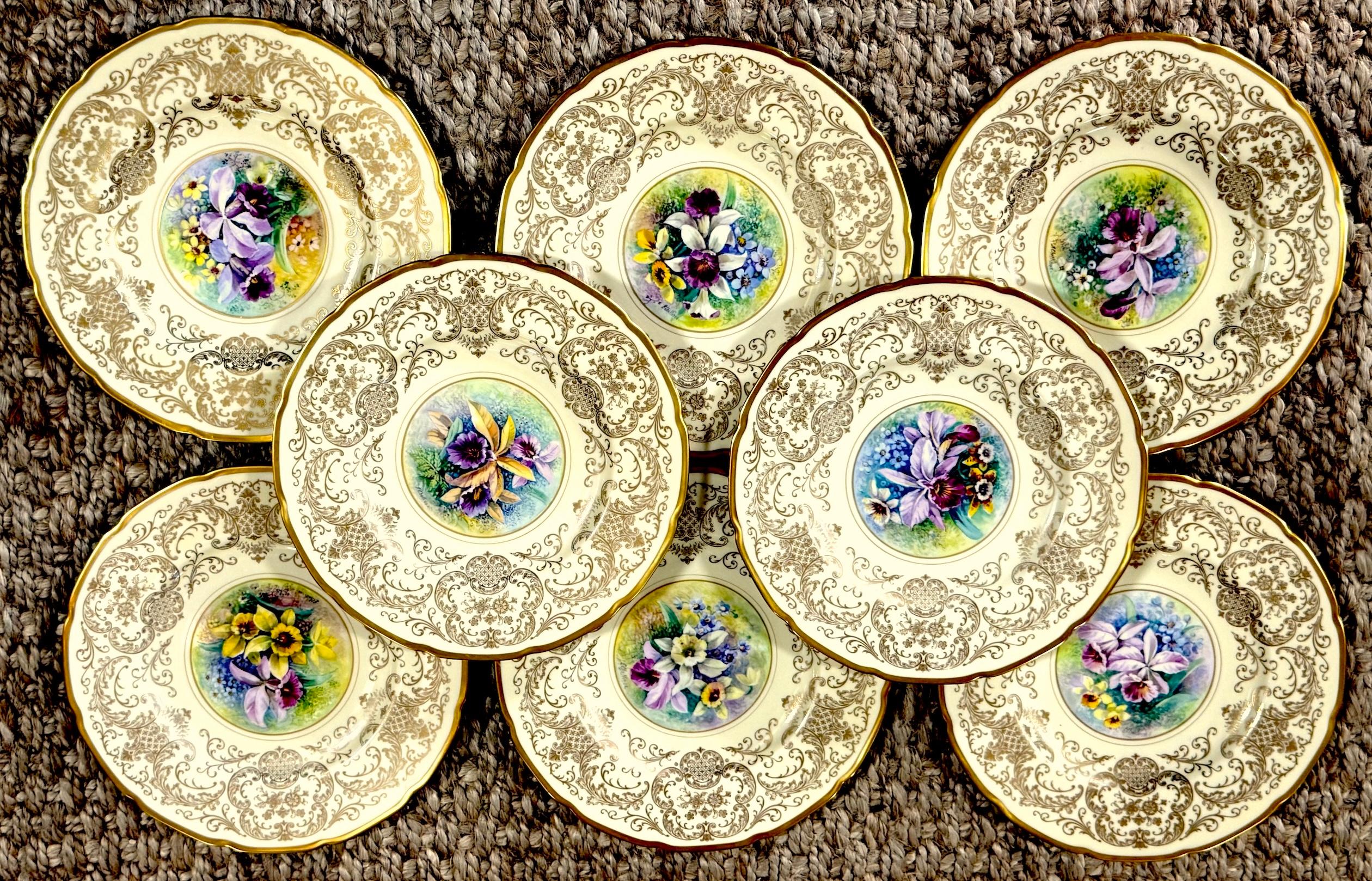 8 Orchid Conservatory Service Plates Painted and Signed E. Challinor for Pickard

Set of eight hand-painted orchid service plates, each painted and signed by Pickard studio artist E. Challinor, ca. 1925–1937. Suitable for table use or wall