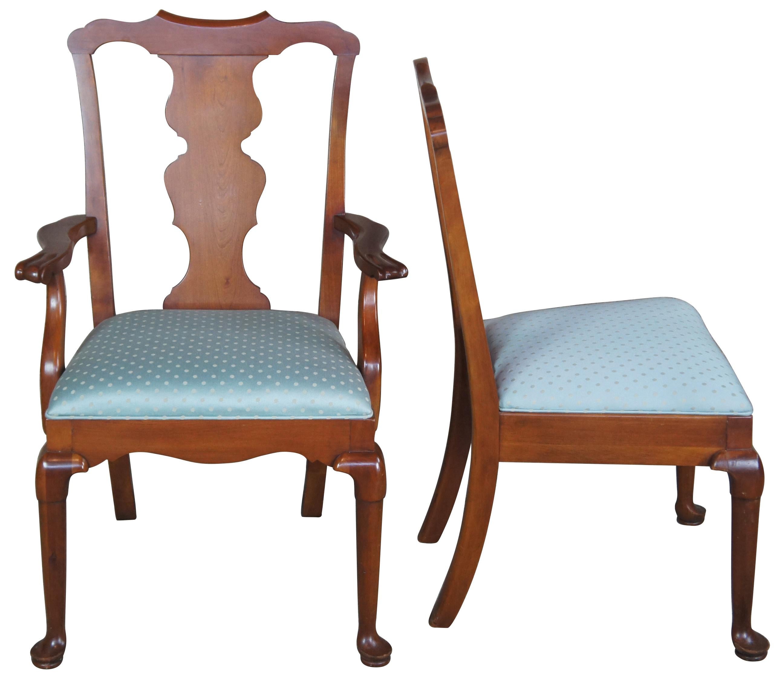 Eight Penn. House dining chairs, circa made from cherry with a blend of early American and Queen Anne styling. Features a vase shaped splat, carved rail and pad feet.