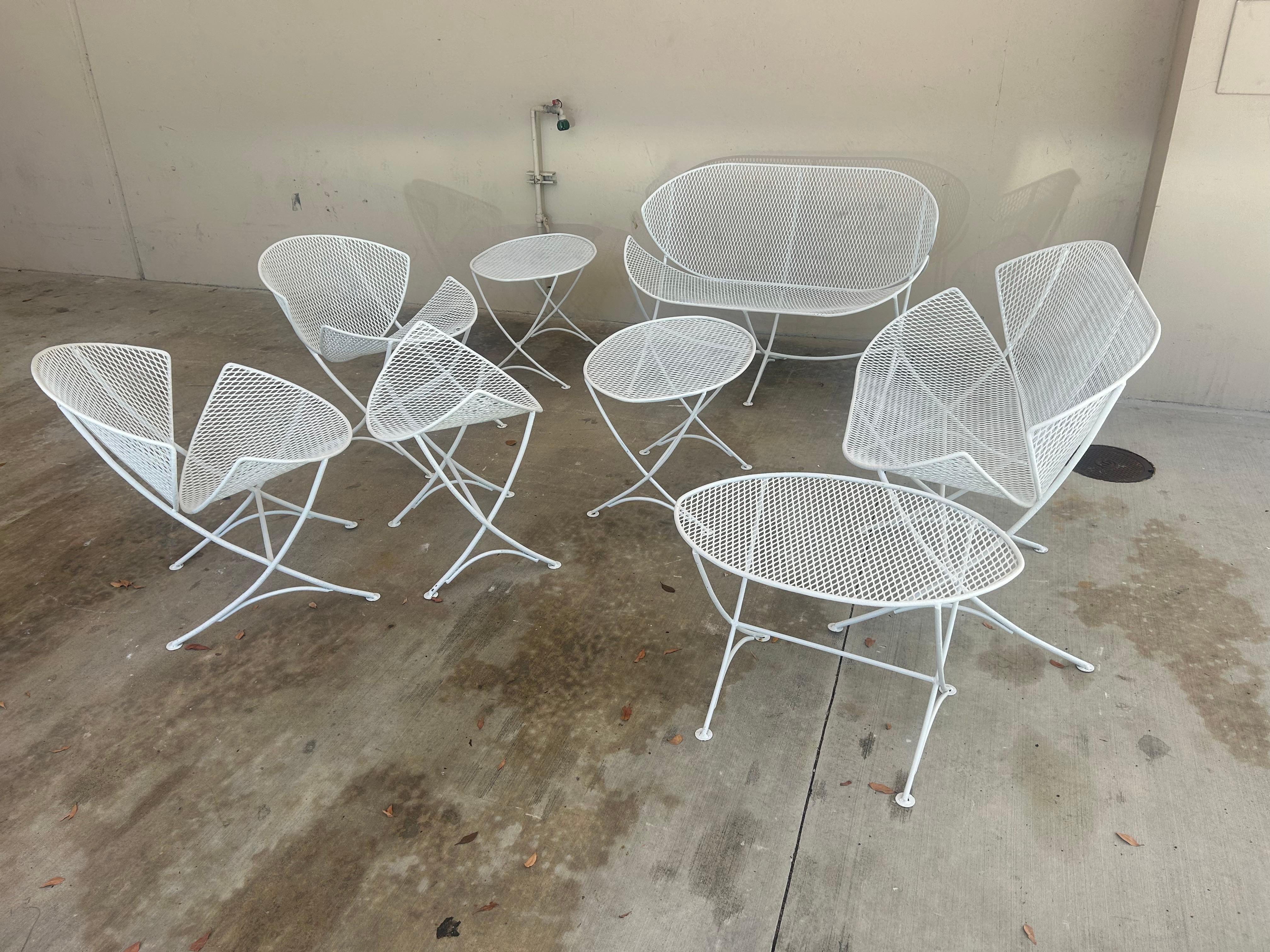 We are willing to separate these pieces for sale.. please inquire.This orange slice Tempestini set has been at the same house for 40 years… It is in very good condition ,never outside, always on an enclosed patio… Has been painted white. It’s entire
