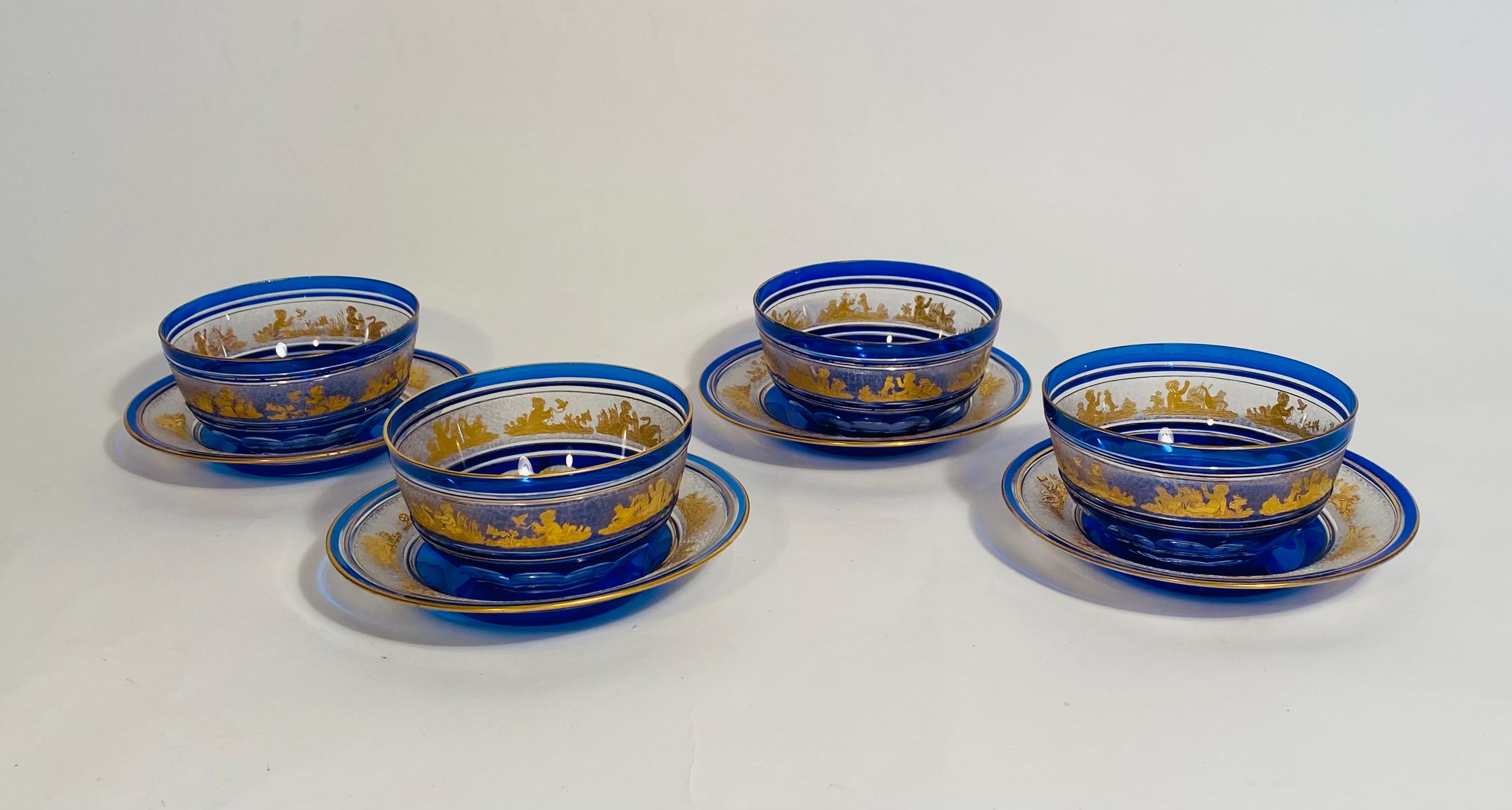 One of the most successful and sought after patterns by Val Saint Lambert is their Danse de Flore. This set of 4 bowls and plates (8 Pieces) is done in a striking cobalt blue crystal. We love the classic gilded pattern on an acid etched background.