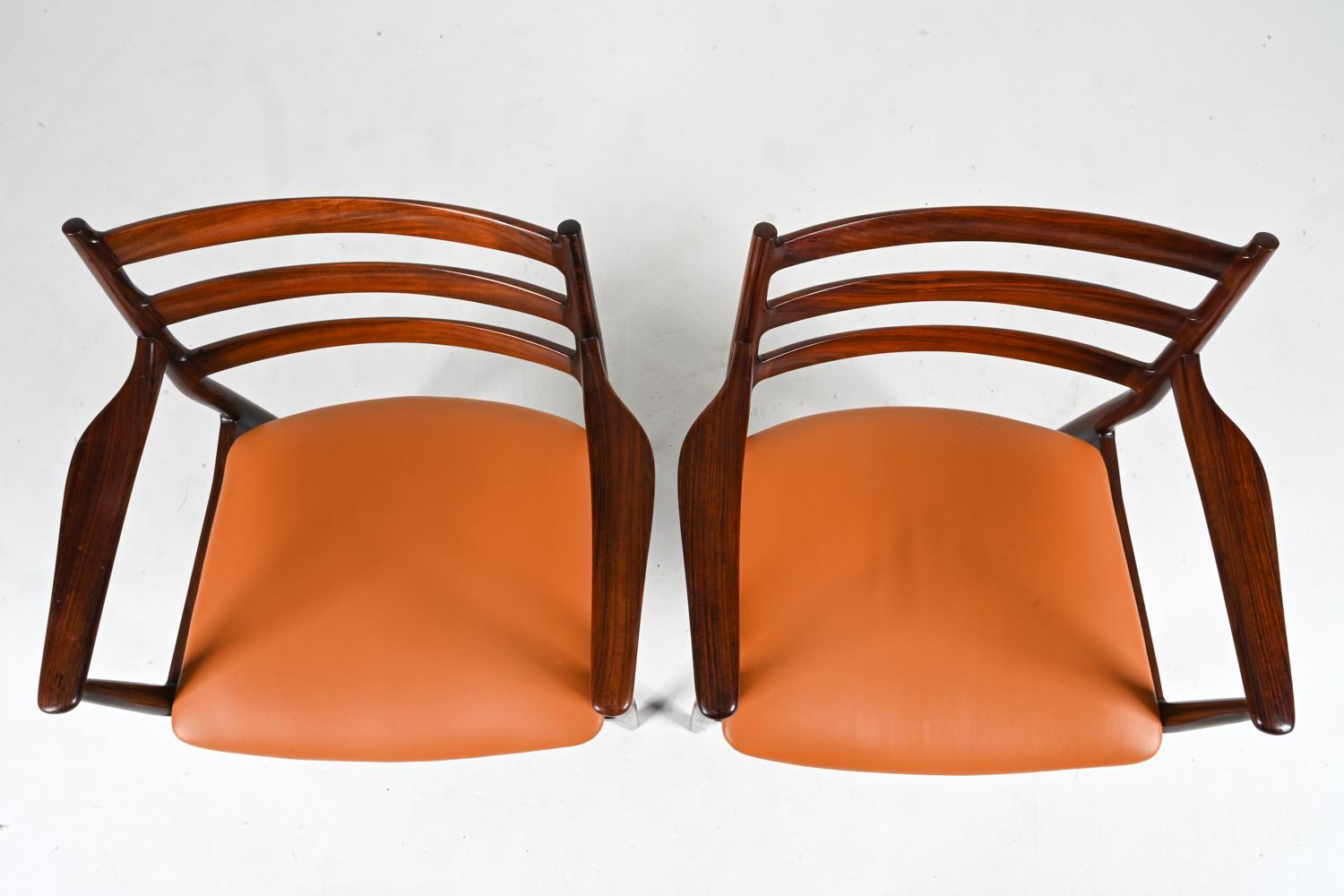 Imitation cuir 8 fauteuils de salle à manger en palissandre attribués à Arne Vodder pour Cado, Danemark en vente