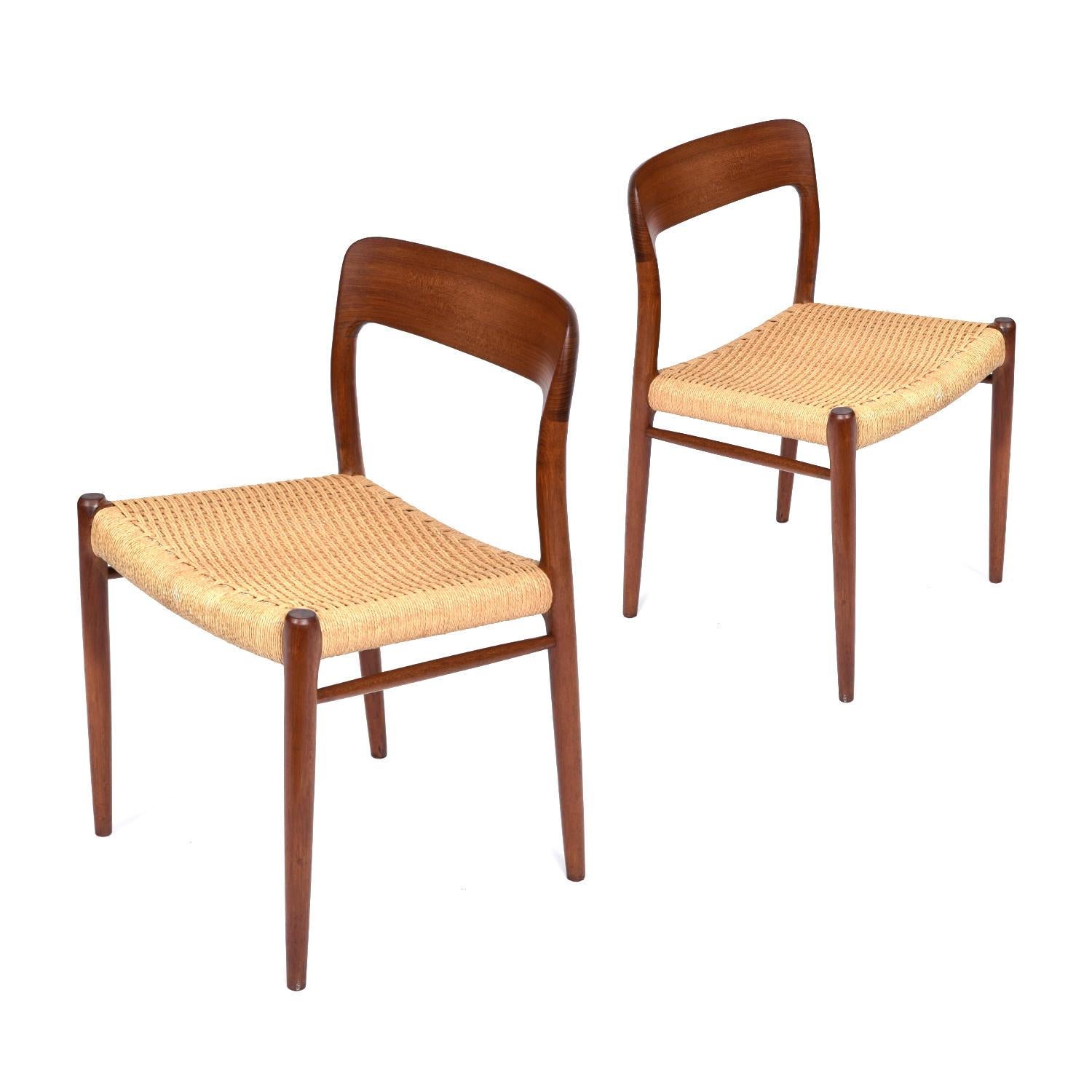 Eight Danish rope seat dining chairs by Niels Otto Moller. The classic roped seat chairs have become icons of Danish Modern design since their introduction by J.L. Moller. The set includes eight model 75 chairs. All of the chairs feature their
