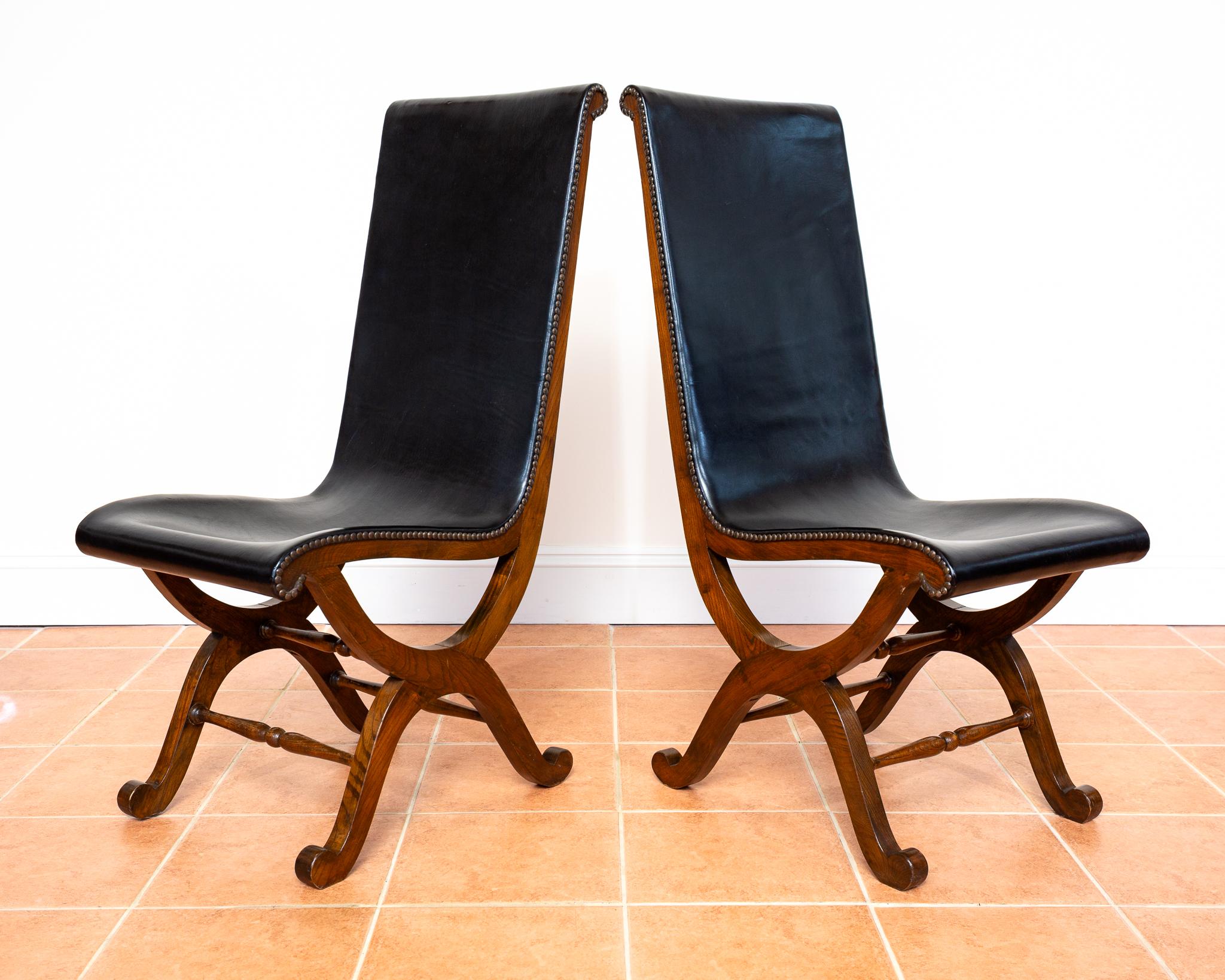 A set of eight superb quality, extremely rare and very impressive Spanish black leather and oak dining chairs in lovely condition. Designed by Pierre Lottier and made by Valmazan in Spain in the late 1950s/early 1960s, these sleek, stylish and