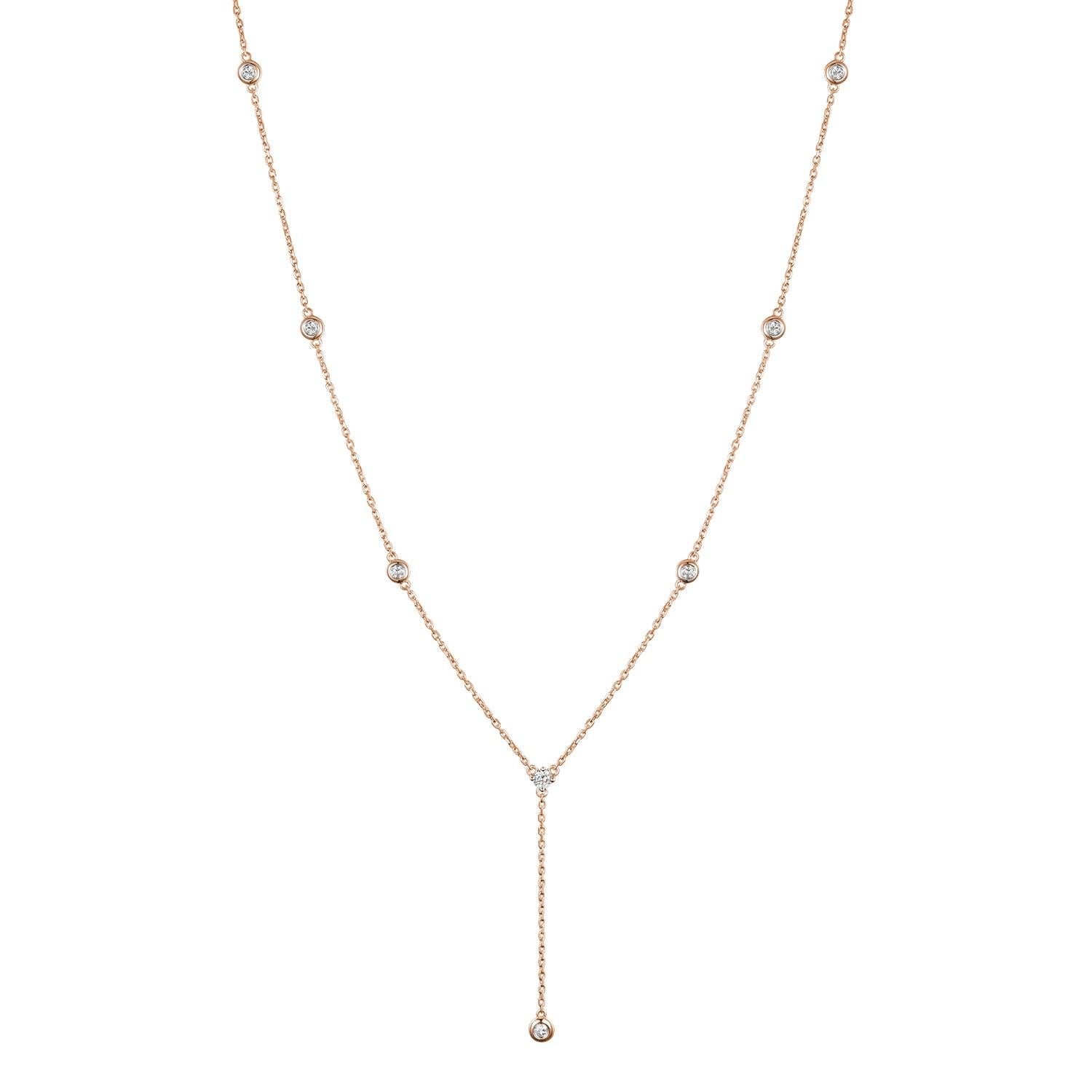 The 14K Rose Gold Diamond Necklace is a versatile and elegant piece of jewelry that effortlessly combines sophistication and charm. This necklace features 0.27 carats of brilliant white round diamonds, adding a timeless sparkle to any outfit. Set in