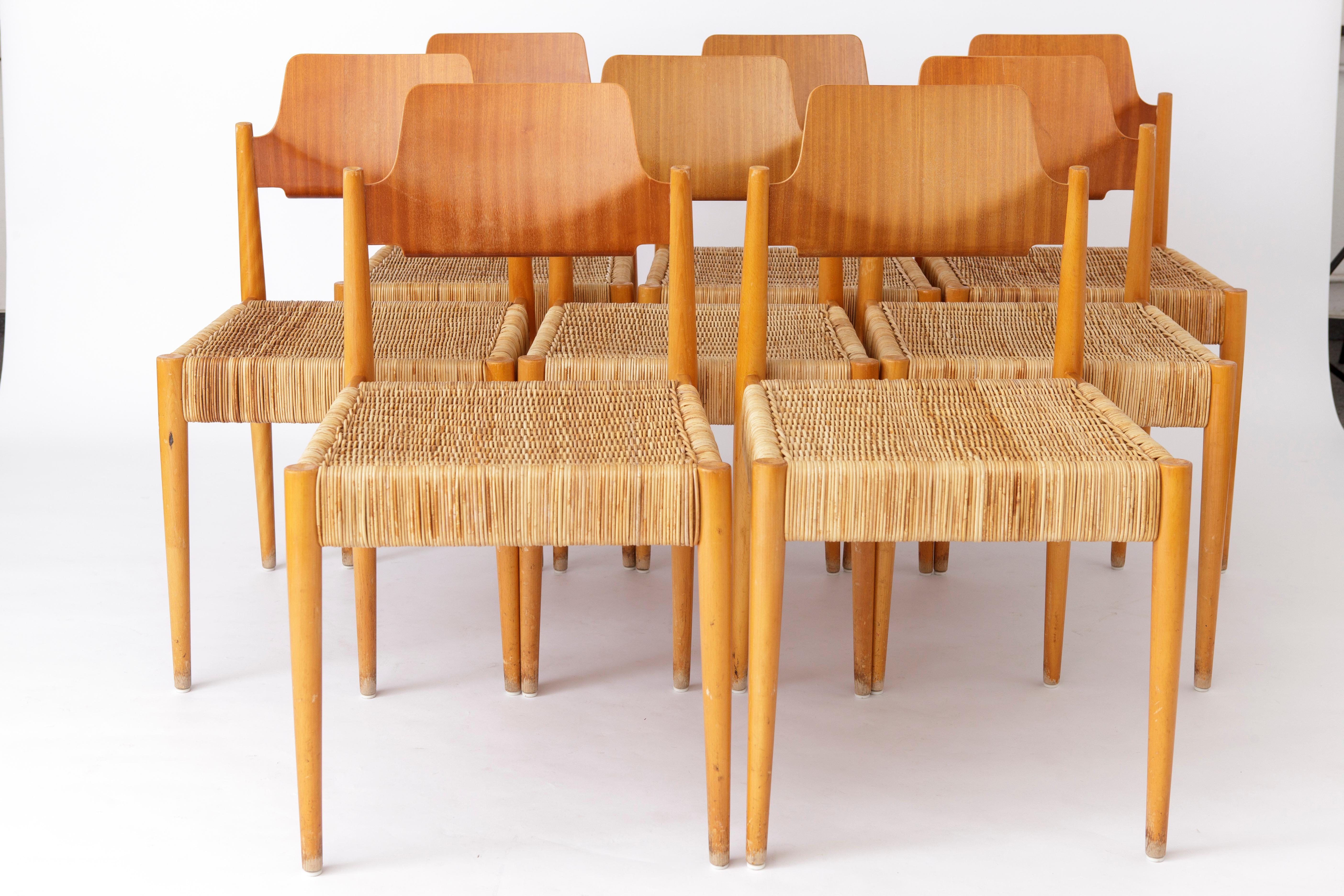 8 unique chairs from Germany Bauhaus designer Egon Eiermann for the manufacturer Wilde + Spieth. 
Model: SE19 from 1953. 
The chairs were used in an old church and have a shelf in the back for a hymnal. 
Beech wood frame in good stable condition, as