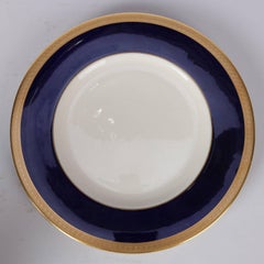 Huit assiettes à dîner "Old Ivory" en porcelaine dorée de Syracuse China