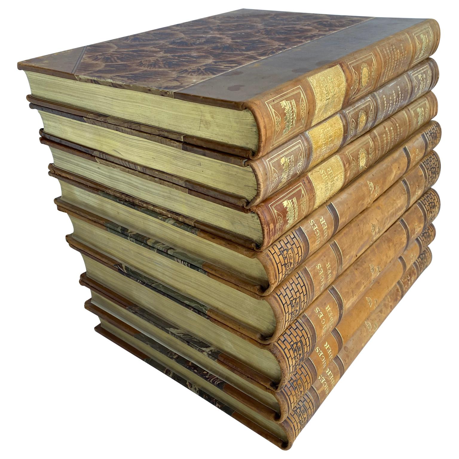 A collection of 8 tall and larger size decorative Swedish leather-bound books from the 1950s. This set consist of 3 plus 5 books describing Swedish town in Swedish.