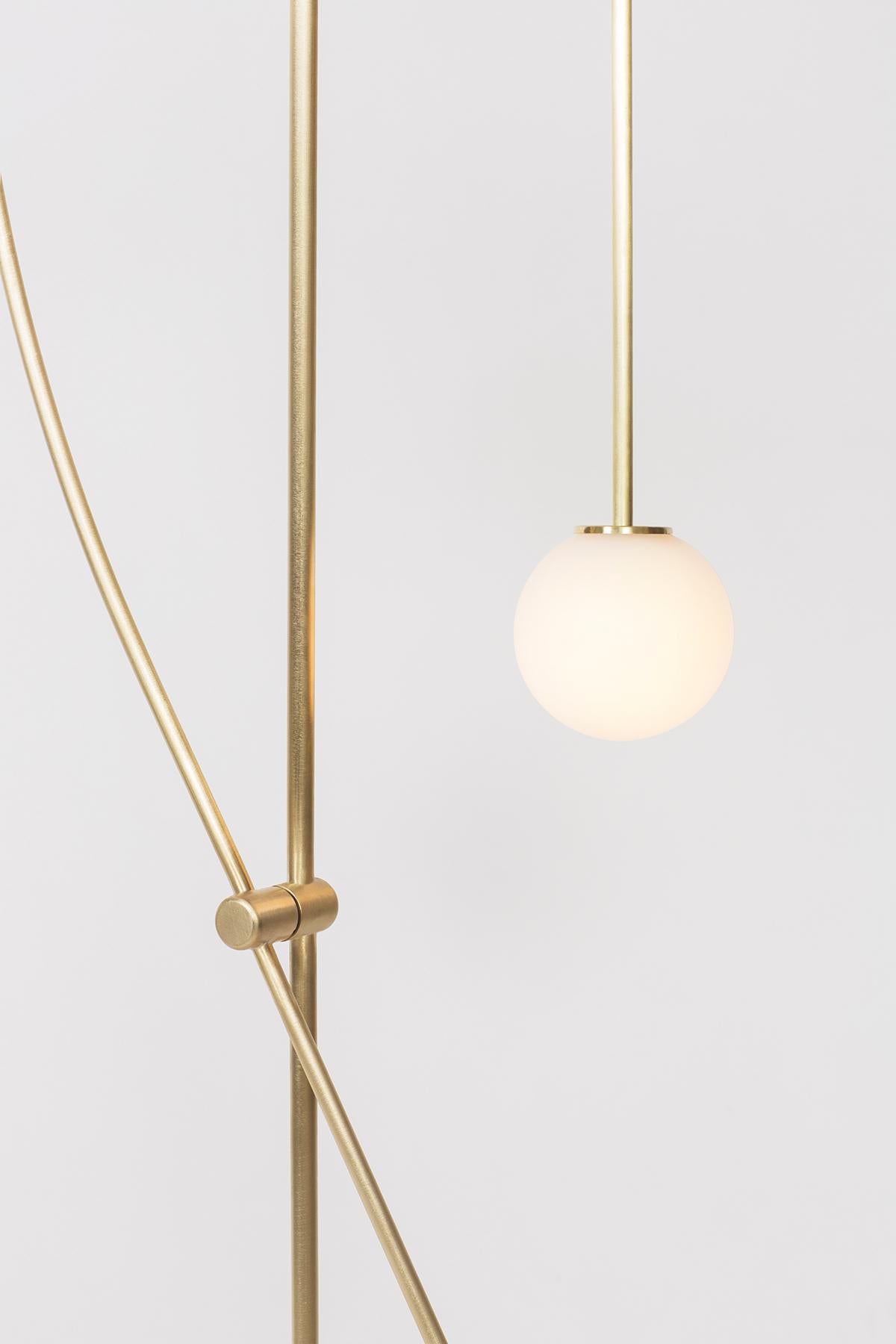 Contemporary 8' Tall Tempo Chandelier in Brass with Handblown Glass Globes For Sale