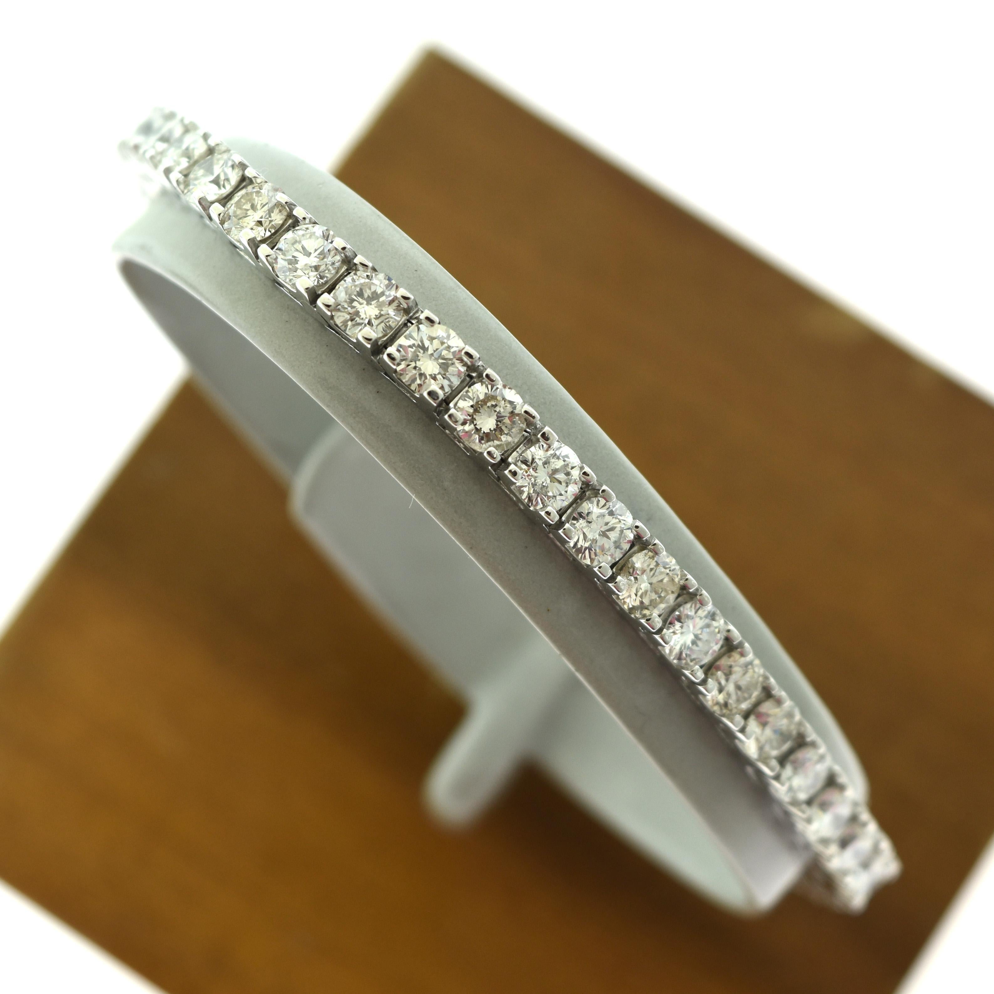 Brilliance Jewels, Miami
Questions? Call Us Anytime!
786,482,8100

Style: Tennis Bracelet

Metal: White Gold 

Metal Purity: 14k ​​

Stone:  42 Round Brilliant Cut Diamonds 

Diamond Color: G-H

Diamond Clarity: SI

Total Carat Weight: approx. 8