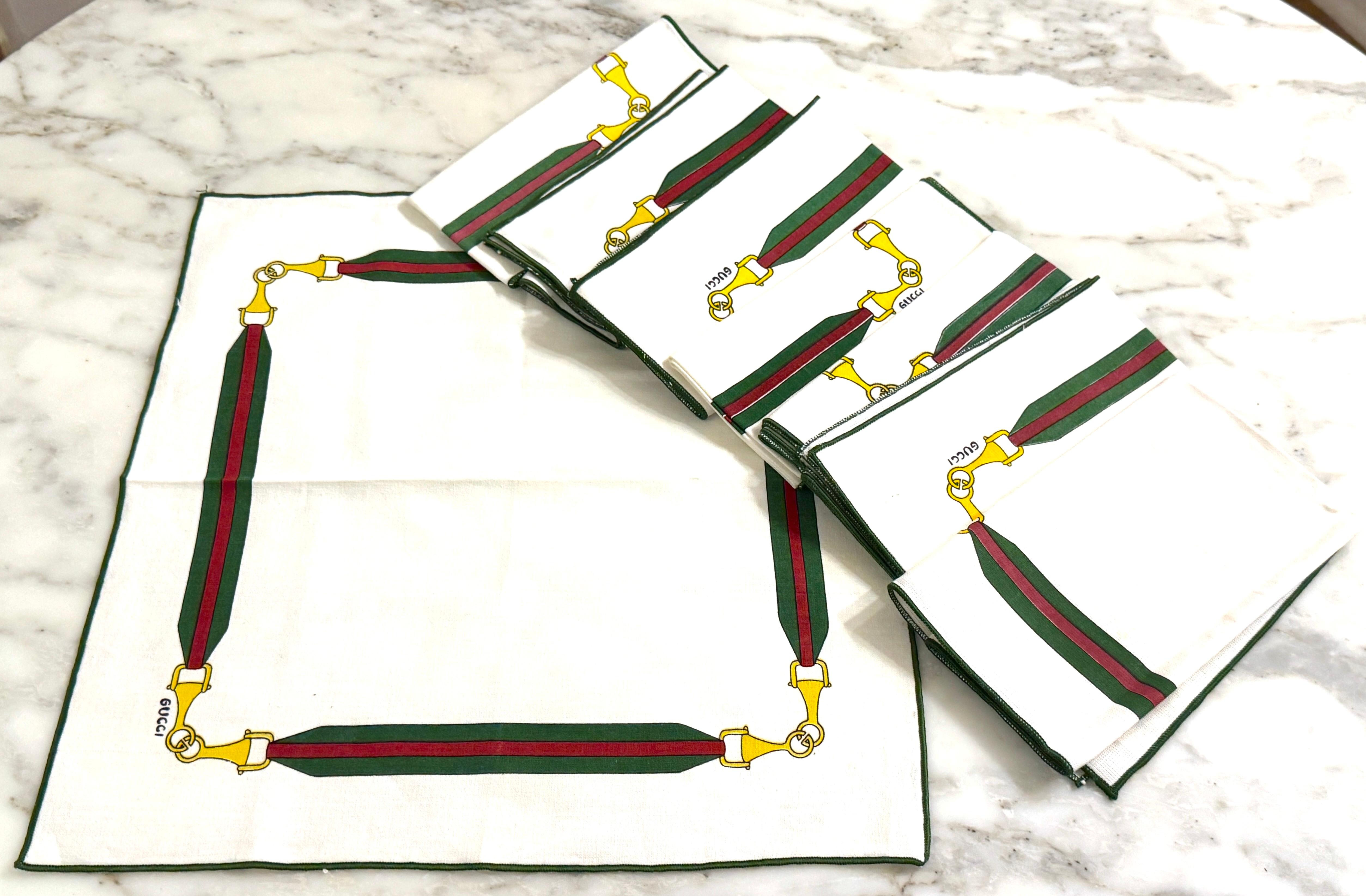 Set of Eight Vintage Gucci Equestrian Napkins with Horsebit Motif, Signed, with Original Storage Bag and Authenticity Card

Italy, circa 1970s–1980s

Dimensions: Each napkin measures 16