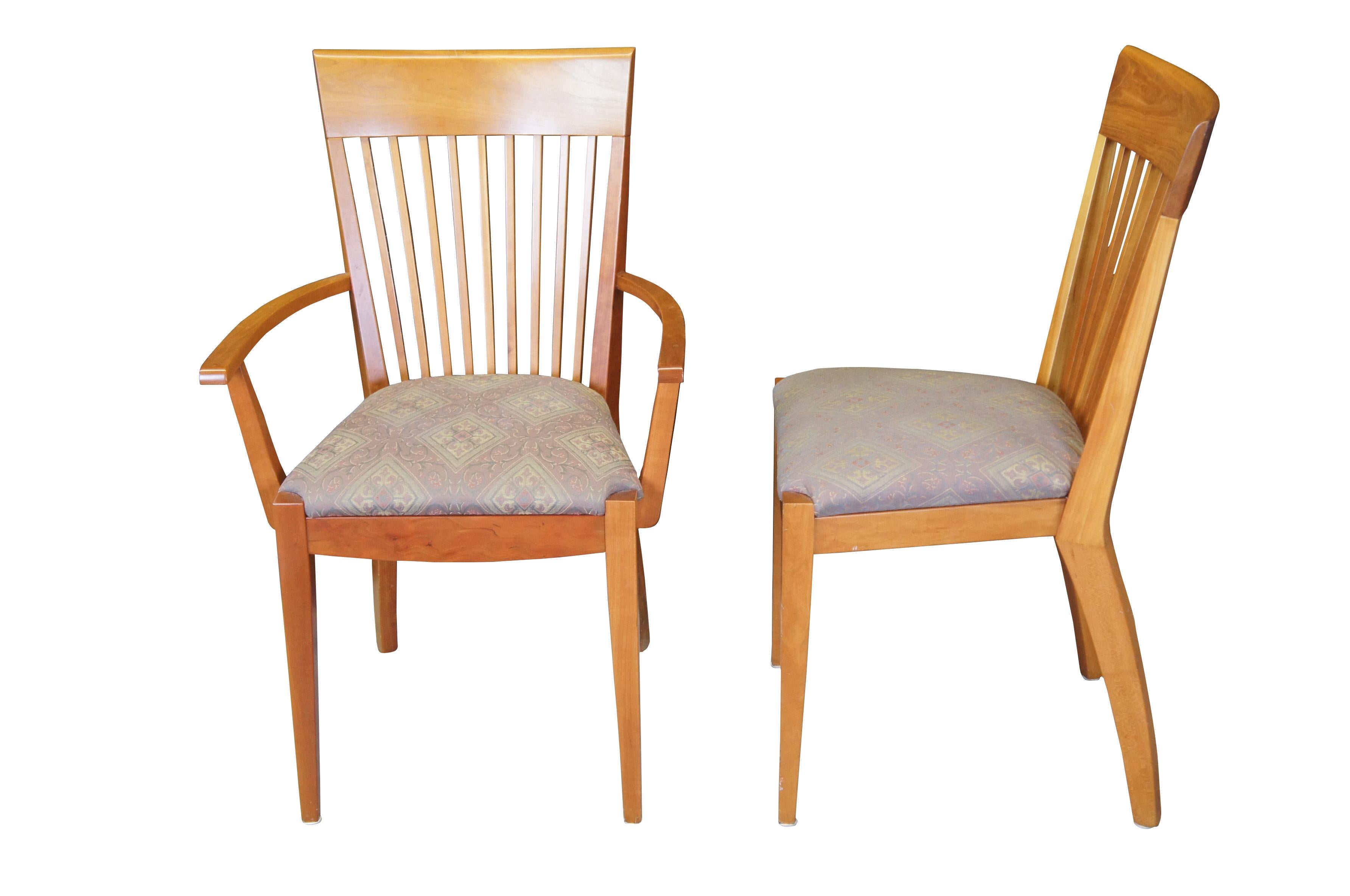 8 Vintage Arhaus farmhouse dining chairs. Made from cherry exclusively for Arhaus in Italy. Features a contoured crest rail, slat back and upholstered seat. The chairs are supported by square tapered legs. Upholstery has a diamond brocade pattern.