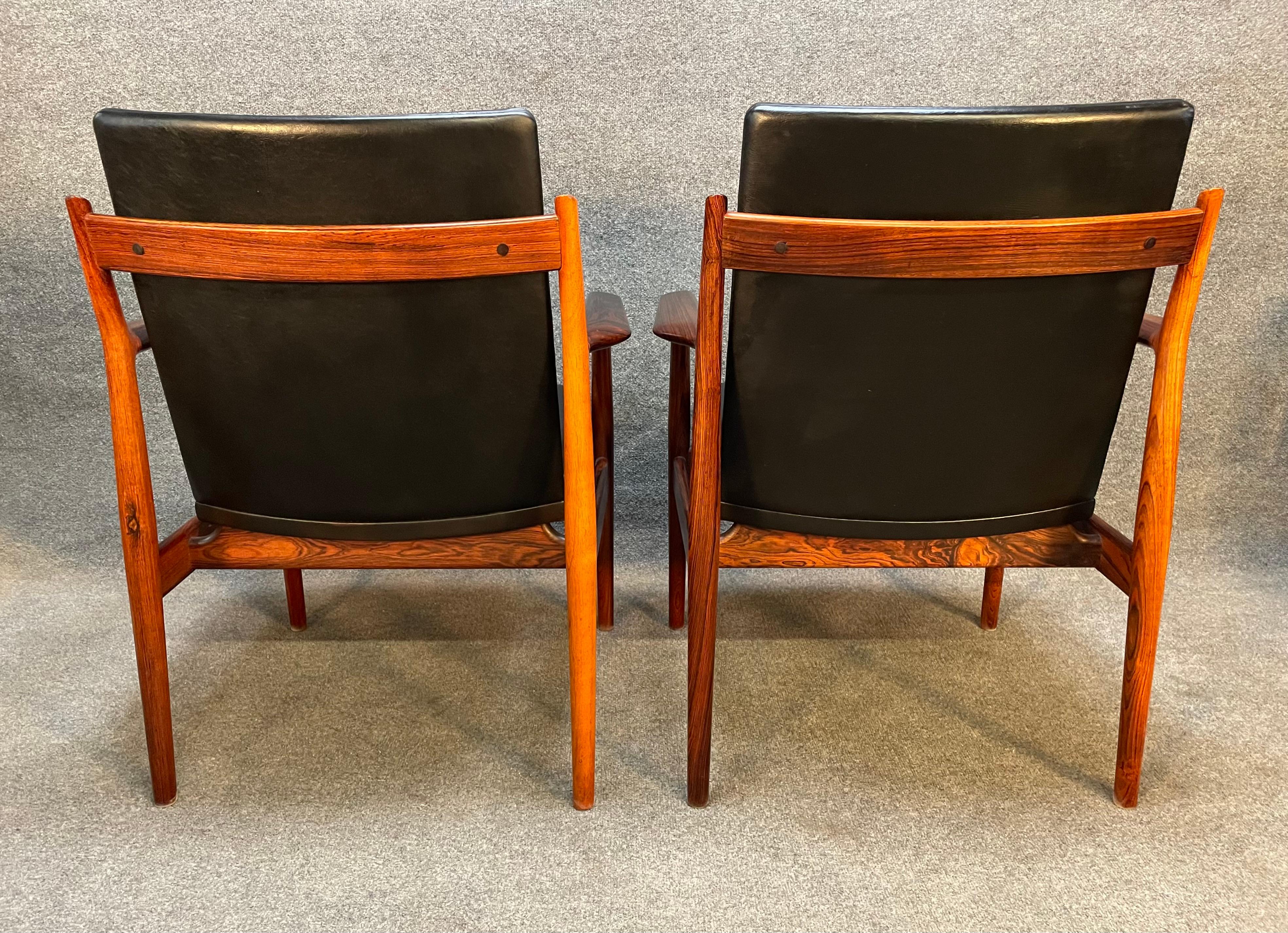 Here is a rare set of eight scandinavian modern armchairs in rosewood and leather 