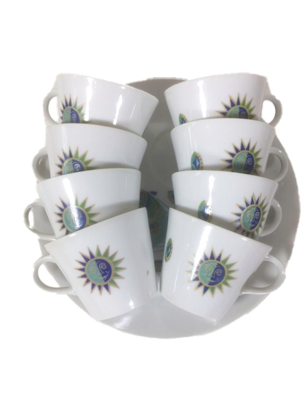 Mid 20th century Georges Briard snack sets, service for 8. In the Fancy Free hot air balloon pattern - each plate has an image of a hot air balloon on a white ground as well as a recess for the cup which is decorated with sun images and other