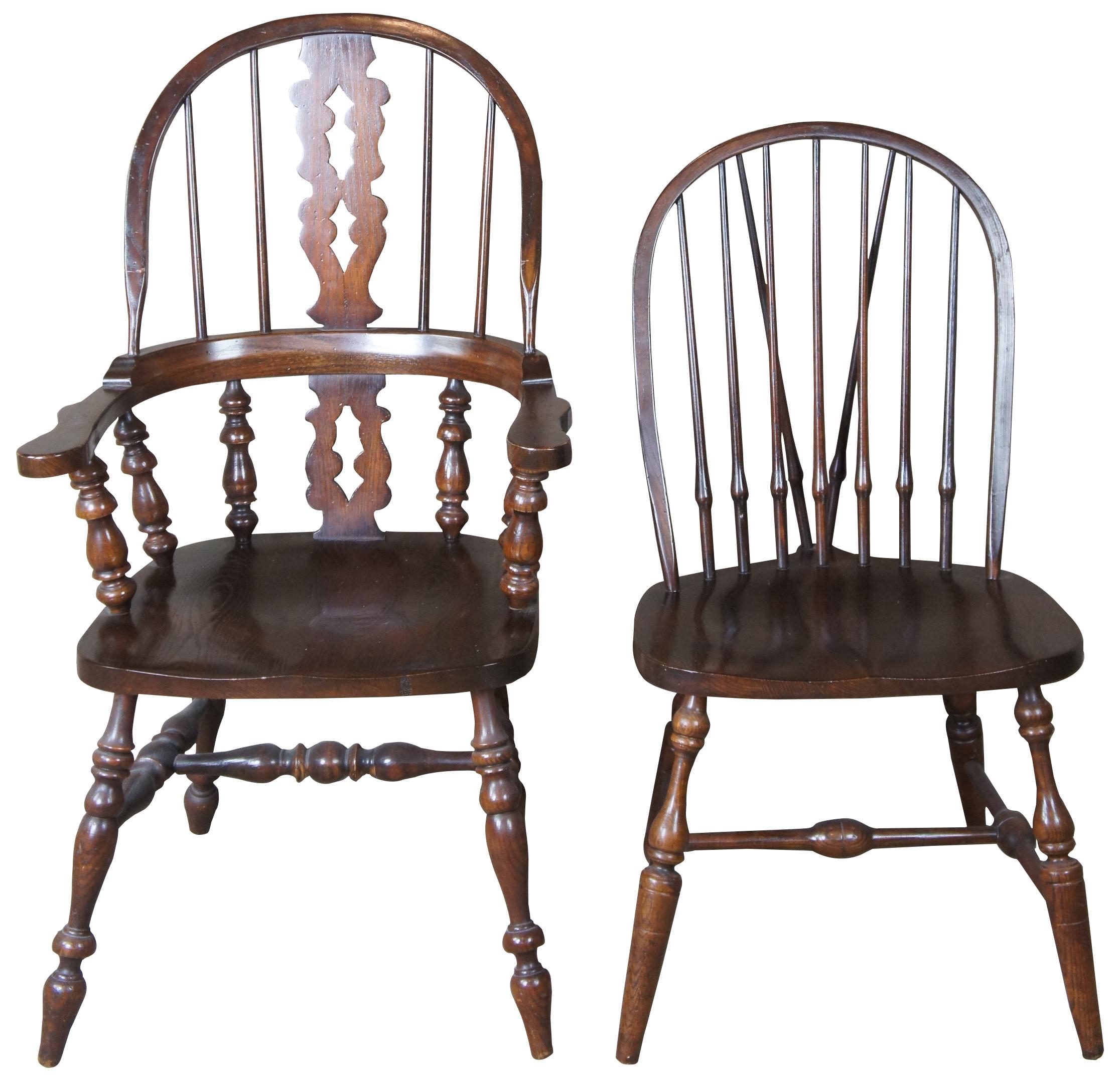 Eight 20th century Pennsylvania House Windsor style dining chairs. Finished in oak with two English Windsor armchairs in addition to the six brace back side chairs. Neatly designed with a saddle seat, turned legs connected by