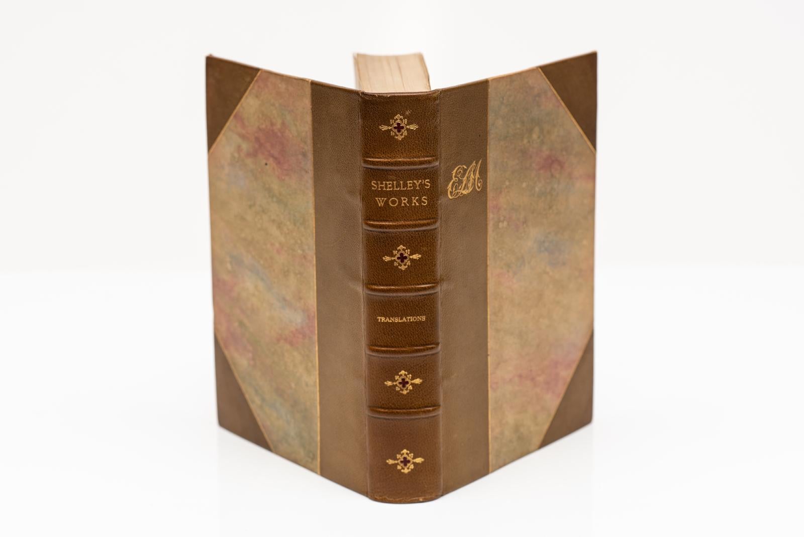 8 Volumes. Percy Bysshe Shelley, The Works. Edited by Nathan Haskall Dole. Edition de Luxe. Special handmade edition. Bound in 3/4 tan morocco with marbled boards. Gilt-tooling on covers and raised band spine. All edges gilt. Marbled endpapers.