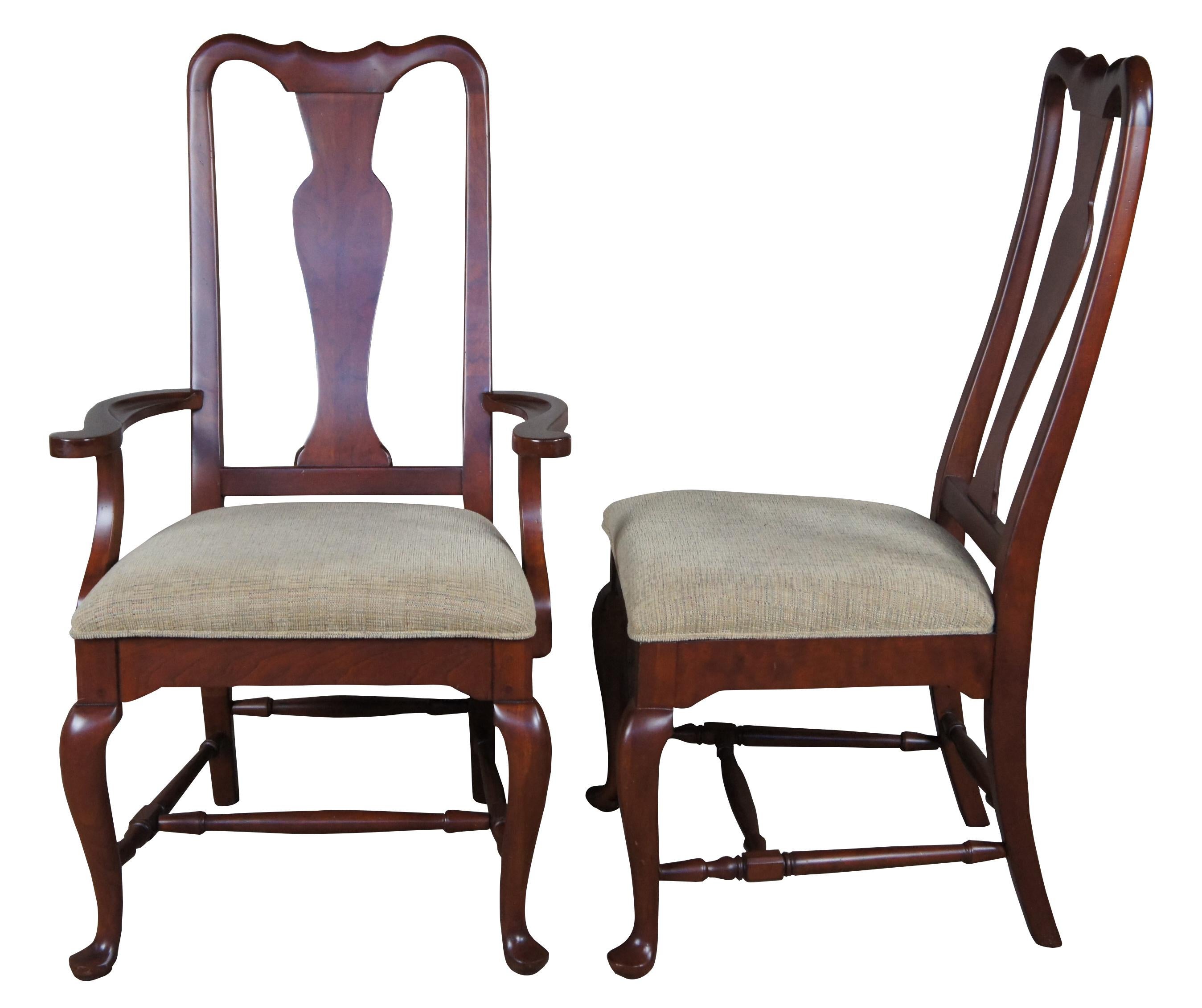 An elegant set of solid cherry dining room chairs by Bob Timberlake for Lexington, circa 1980s. Classic Queen Anne styling with a grooved crest over vase shaped splats. The chairs are supported by cabriole legs with pad feet that are connected by
