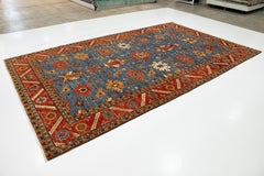 8 x 14 Contemporary Serapi-Style Blue Wool Rug Featuring a Floral Design