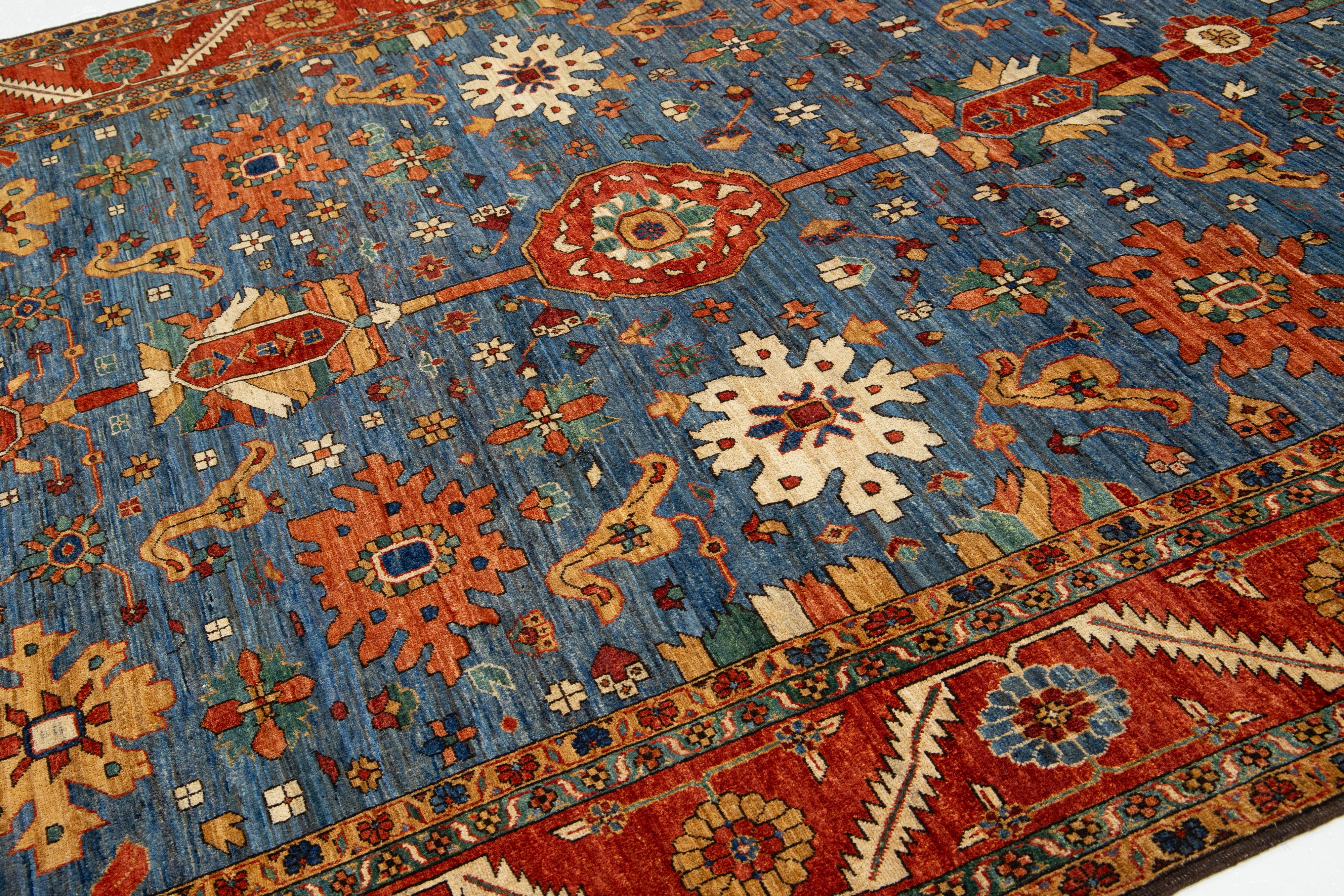 Islamic 8 x 14 Contemporary Serapi-Style Blue Wool Rug Featuring a Floral Design For Sale