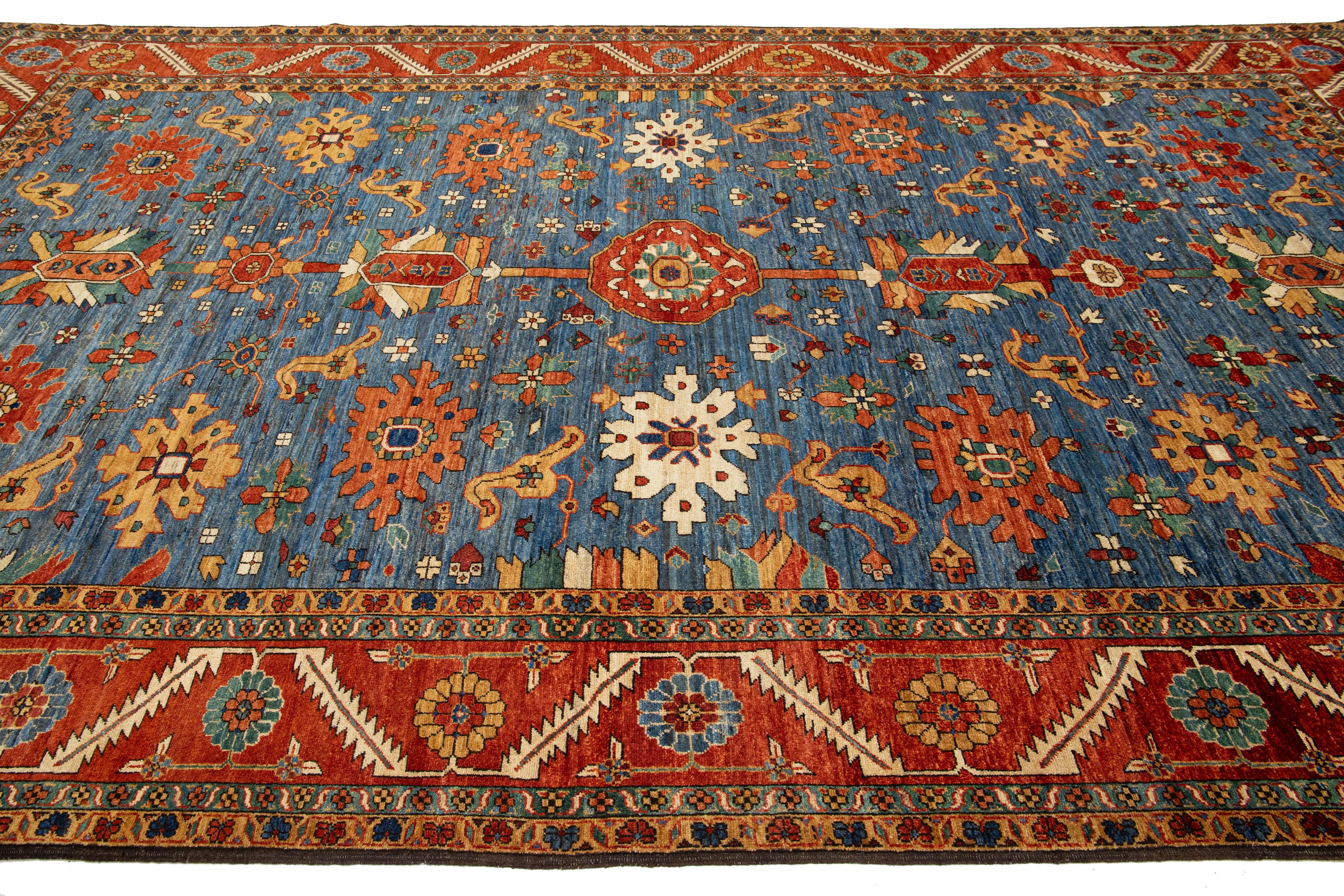 Hand-Knotted 8 x 14 Contemporary Serapi-Style Blue Wool Rug Featuring a Floral Design For Sale