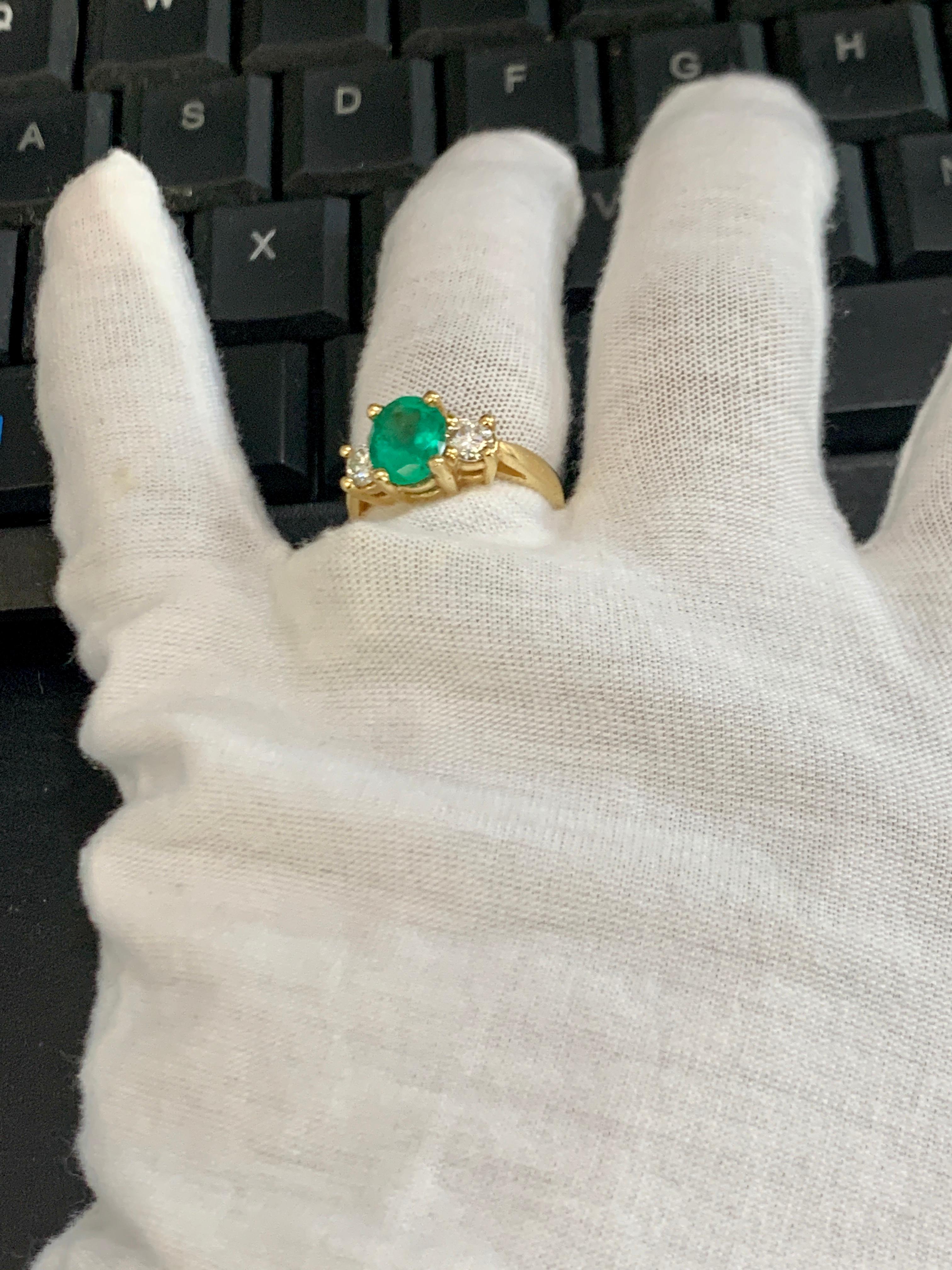 Oval Emerald and Diamond Three-Stone Ring 14 Karat Yellow Gold For Sale 5