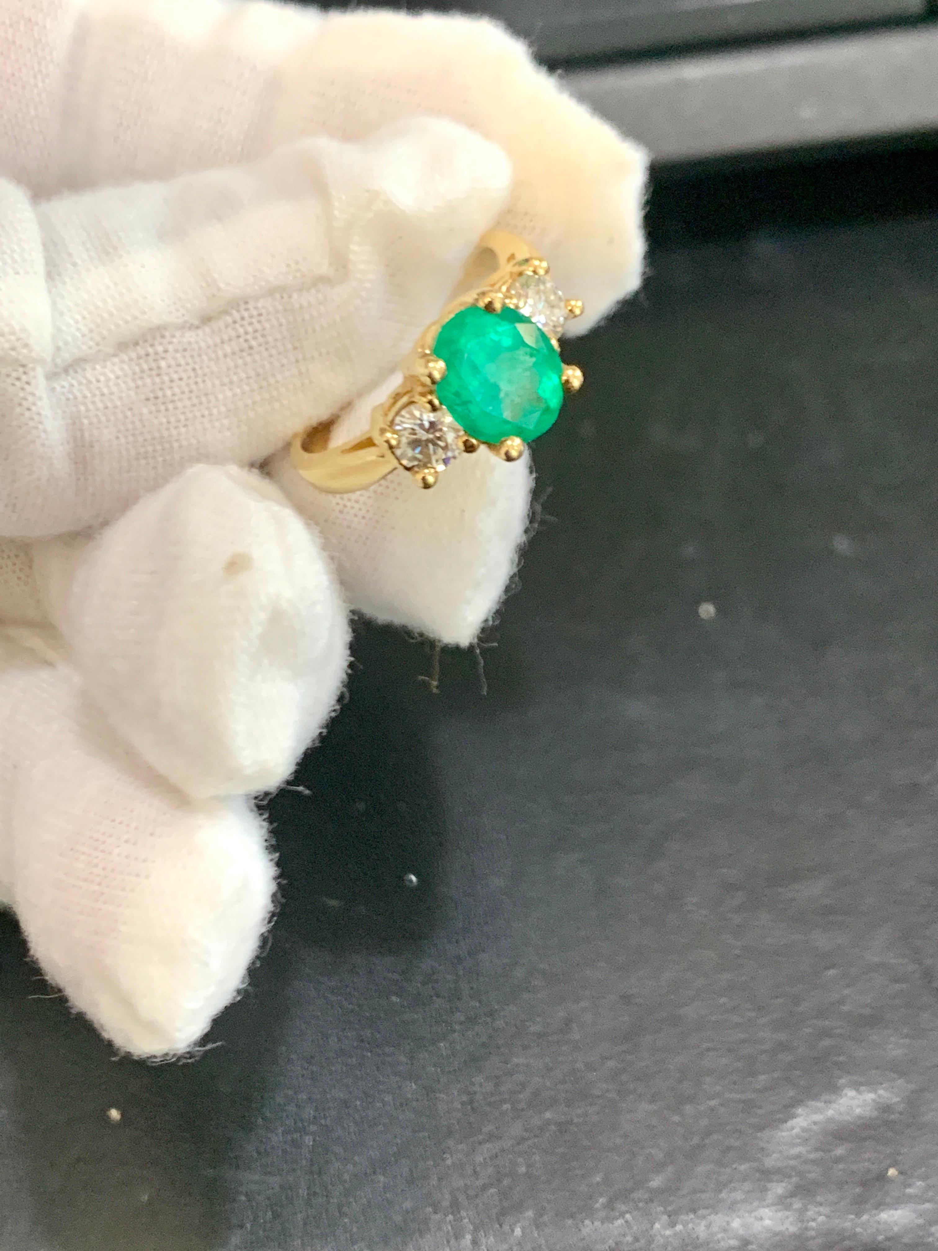 Oval Emerald and Diamond Three-Stone Ring 14 Karat Yellow Gold For Sale 1