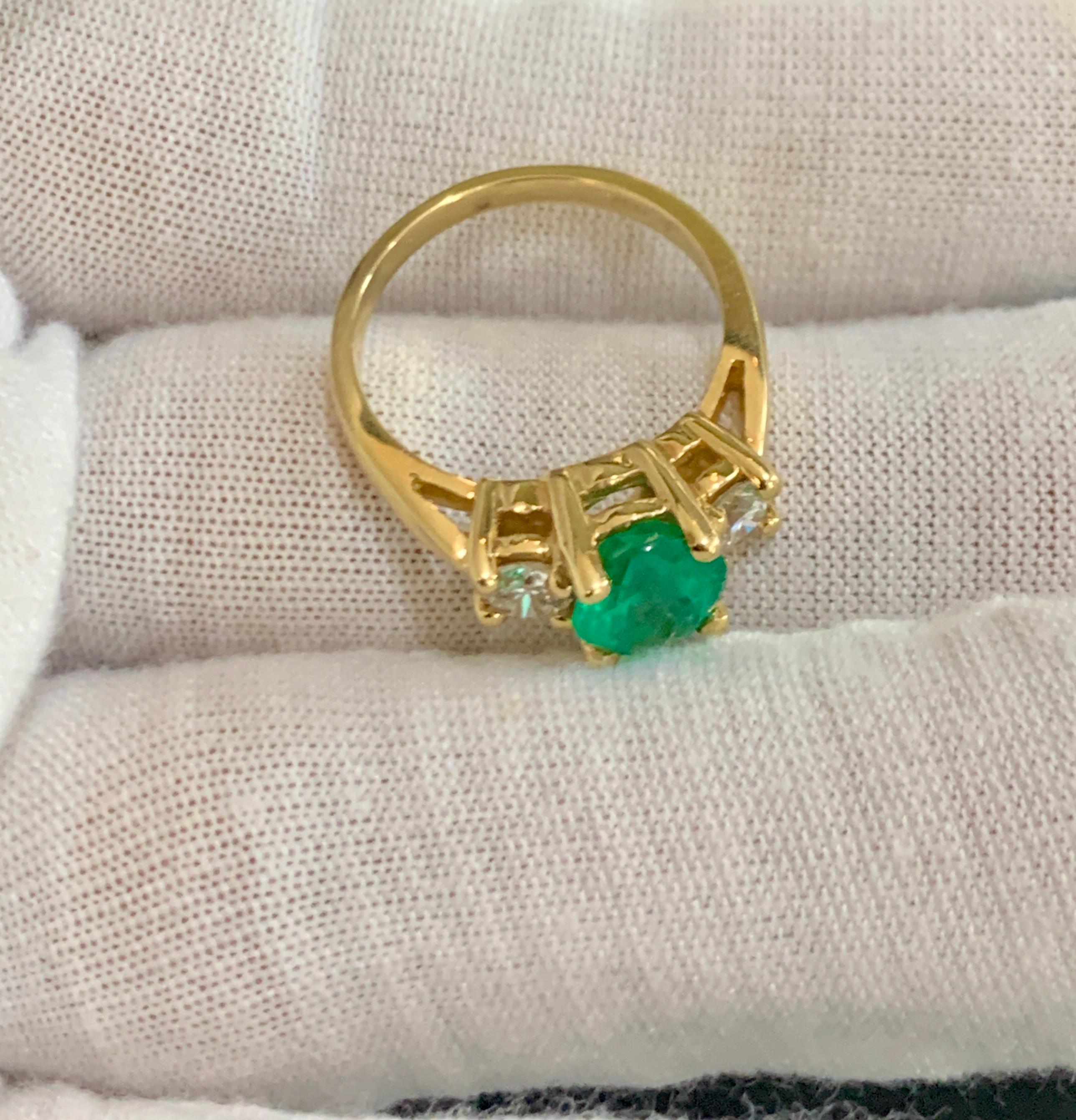 Oval Emerald and Diamond Three-Stone Ring 14 Karat Yellow Gold For Sale 3