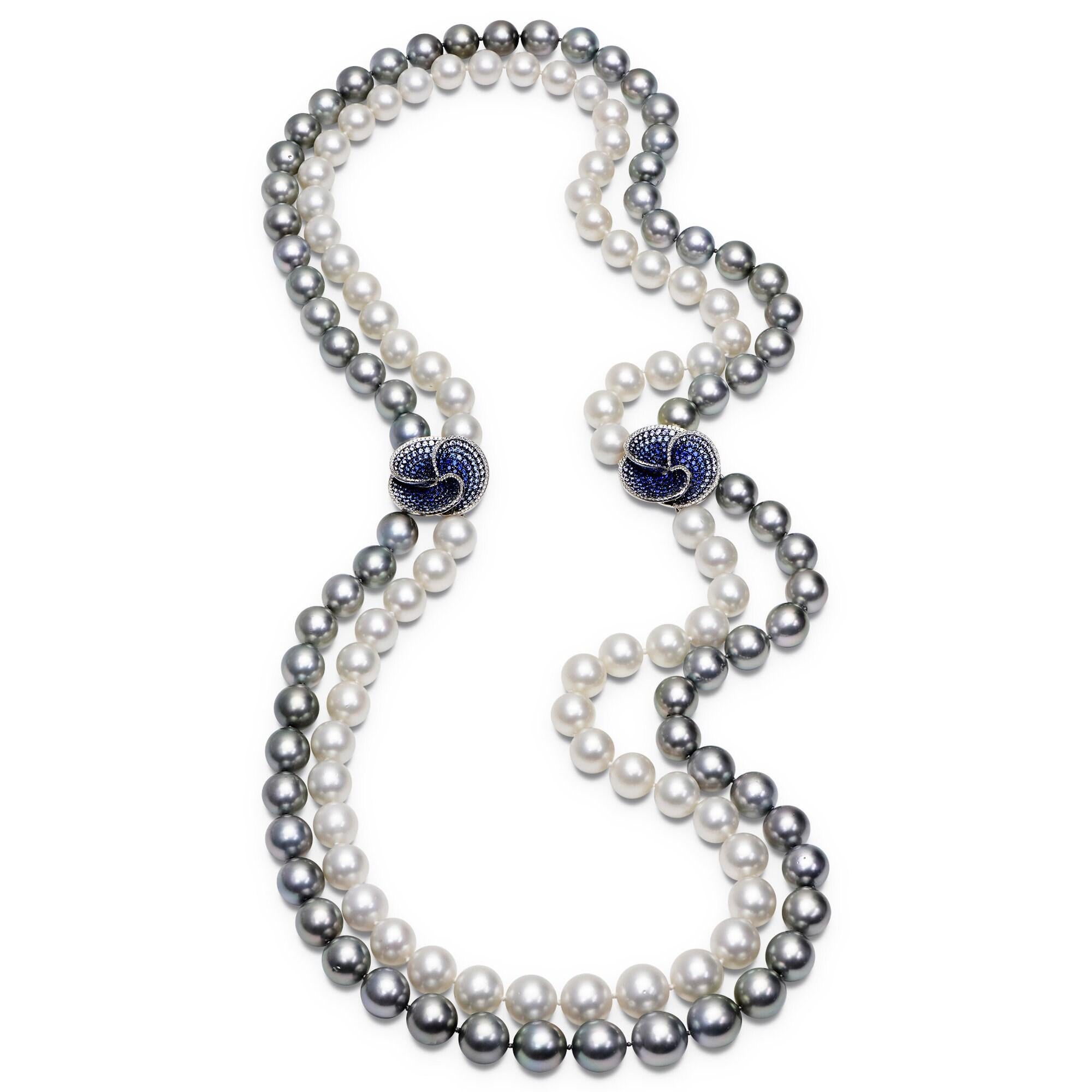 The Following Item we are Offering is this Magnificent 18KT Gold Long Double Strand South Sea Pearl and Tahitian Pearl Necklace. This Gorgeous Necklace features Large Gorgeous Opera South Sea Pearl strand and Opera Tahitian strand 2 blue sapphire