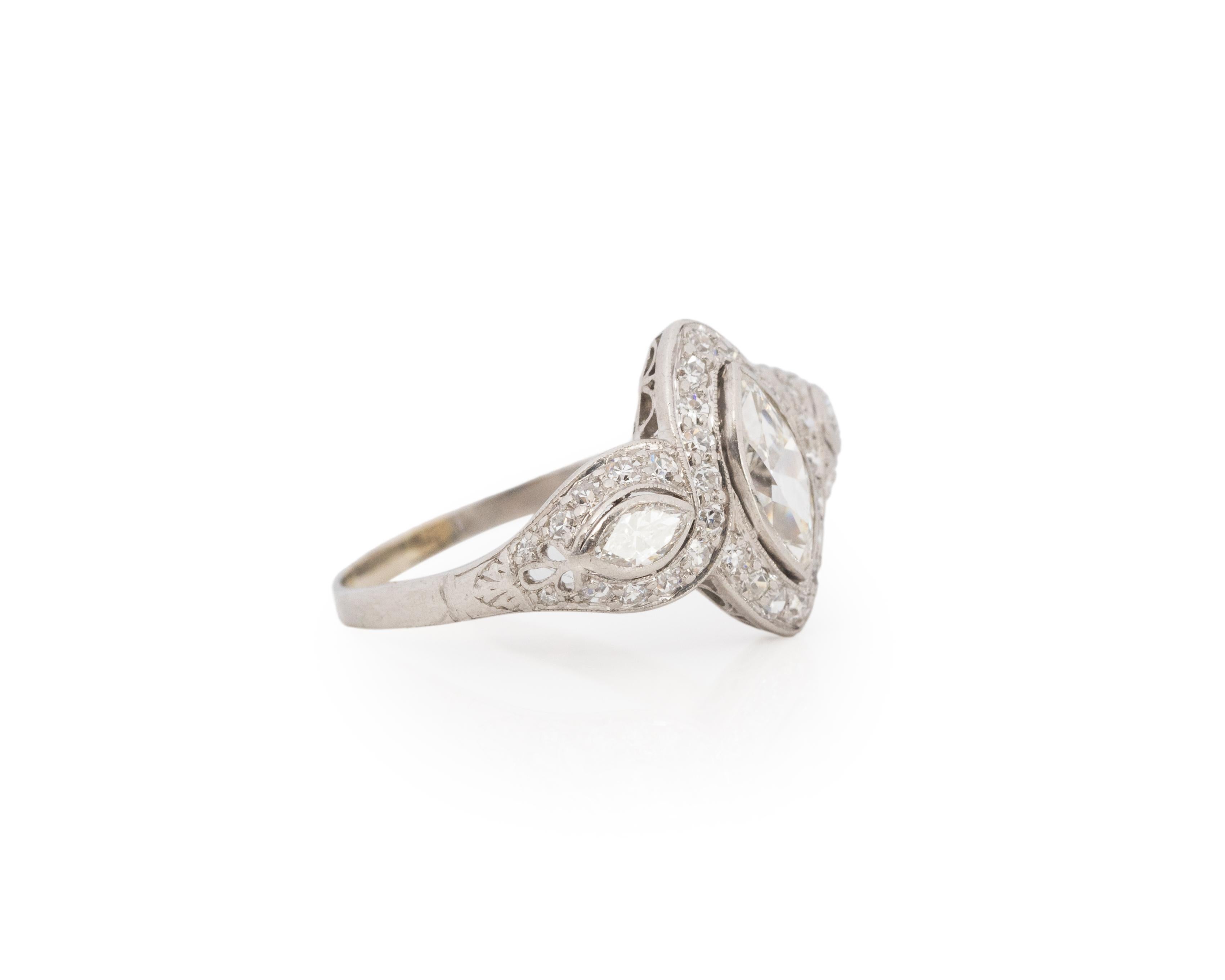 Ring Size: 8.25
Metal Type: Platinum [Hallmarked, and Tested]
Weight: 4.8 grams

Center Diamond Details:
Weight: .80ct
Cut: Antique Marquise
Color: F
Clarity: VS

Side Diamond Details:
Weight: 1.00ct, total
Cut: Old European brilliant & Antique
