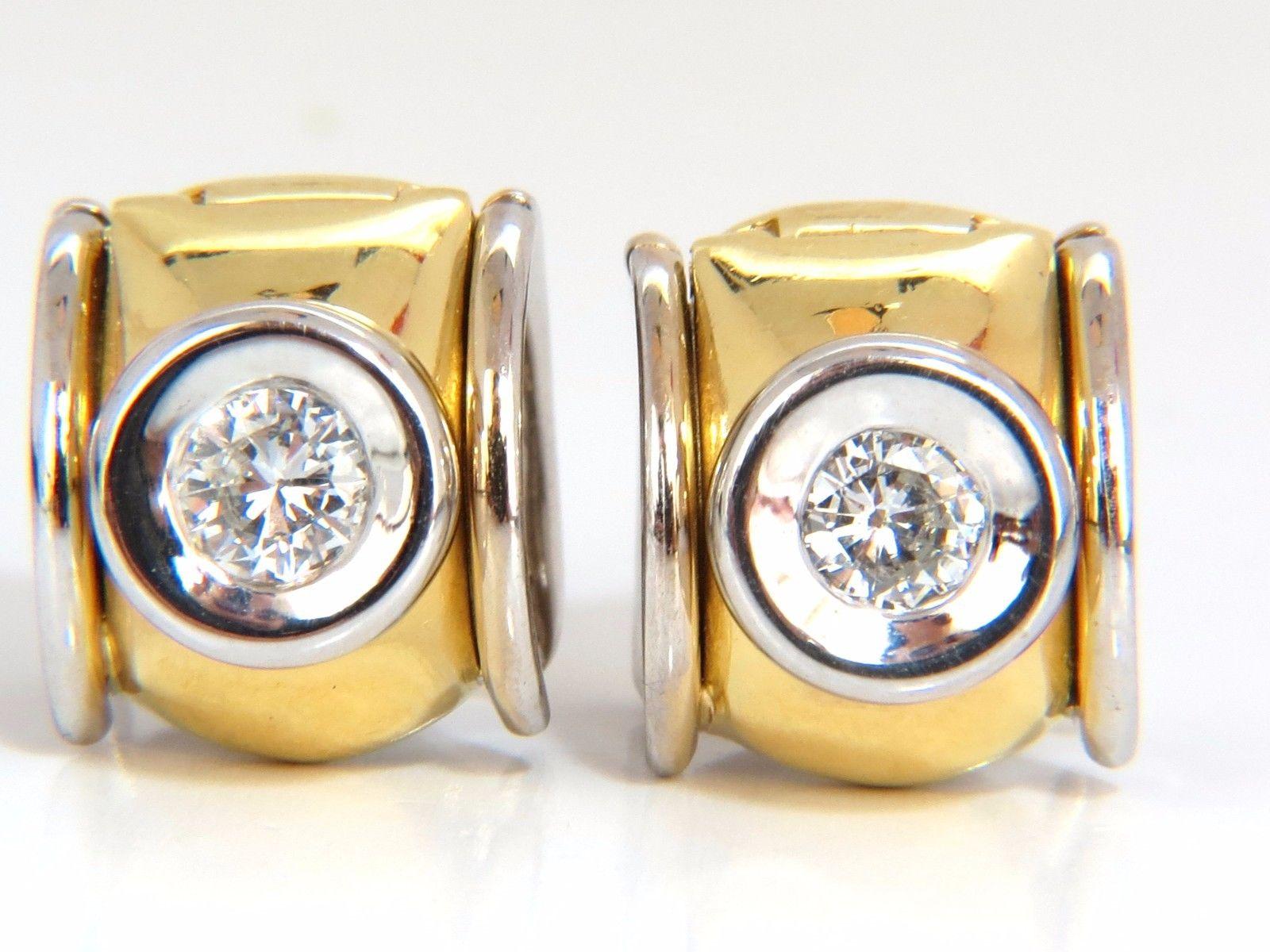 Low Lobe, Petite Elegance

.80ct. Natural Round, Brilliant diamonds huggie clip earrings.

G color, Si-1 clarity

Full cuts, great sparkle.

Flush set, smooth

.60 inch in diameter 

.46 inch wide

18.5 grams.

18kt. white & yellow gold. 

Clip