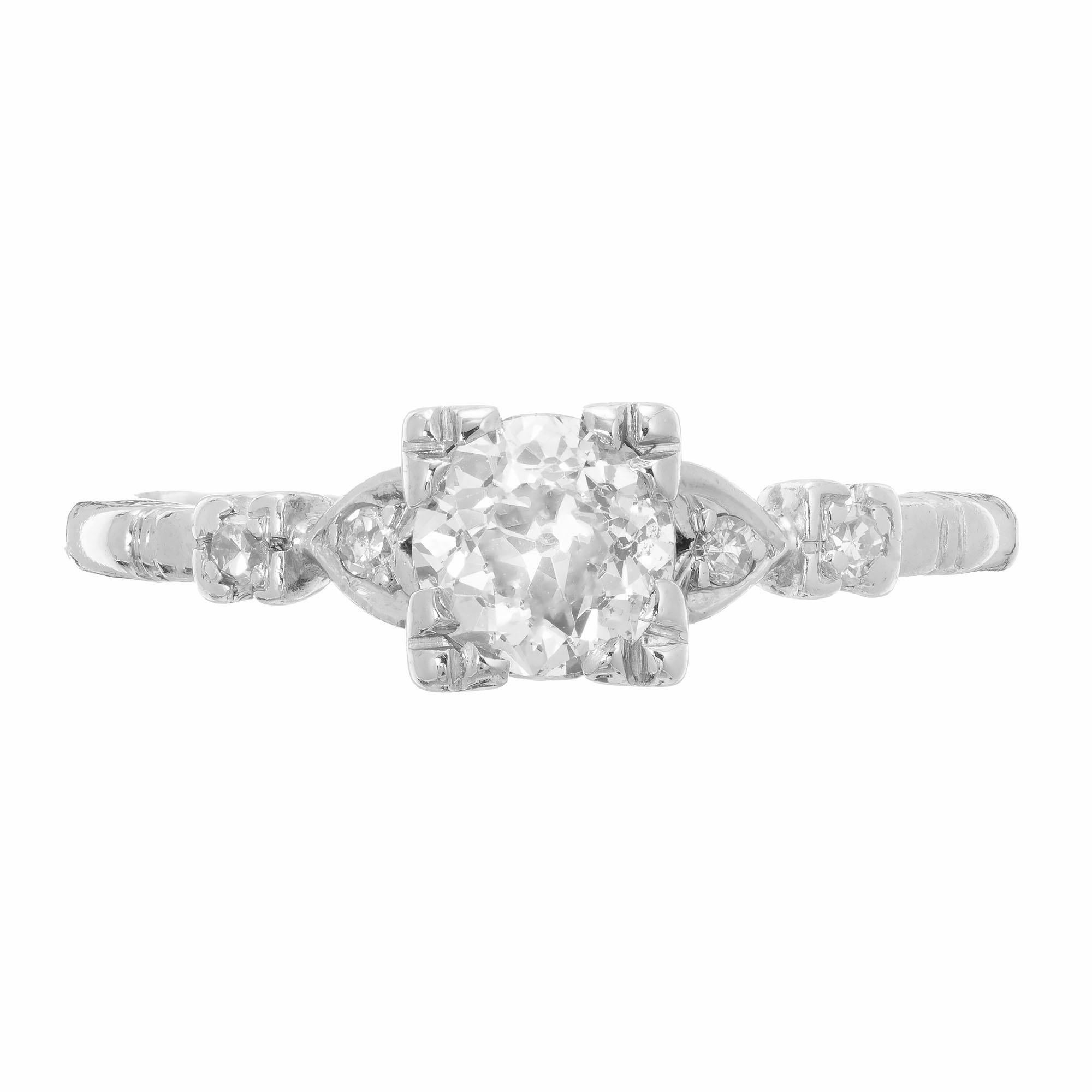 Art Deco 1920-1929 Diamond Platinum engagement ring. EGL certified Old European cut center stone with 4 side diamonds in a platinum setting. 

1 old European cut diamond, approx. total weight .80ct, H to I, SI1, 5.92 x 5.90 x 3.60mm, Depth: 60.9%
