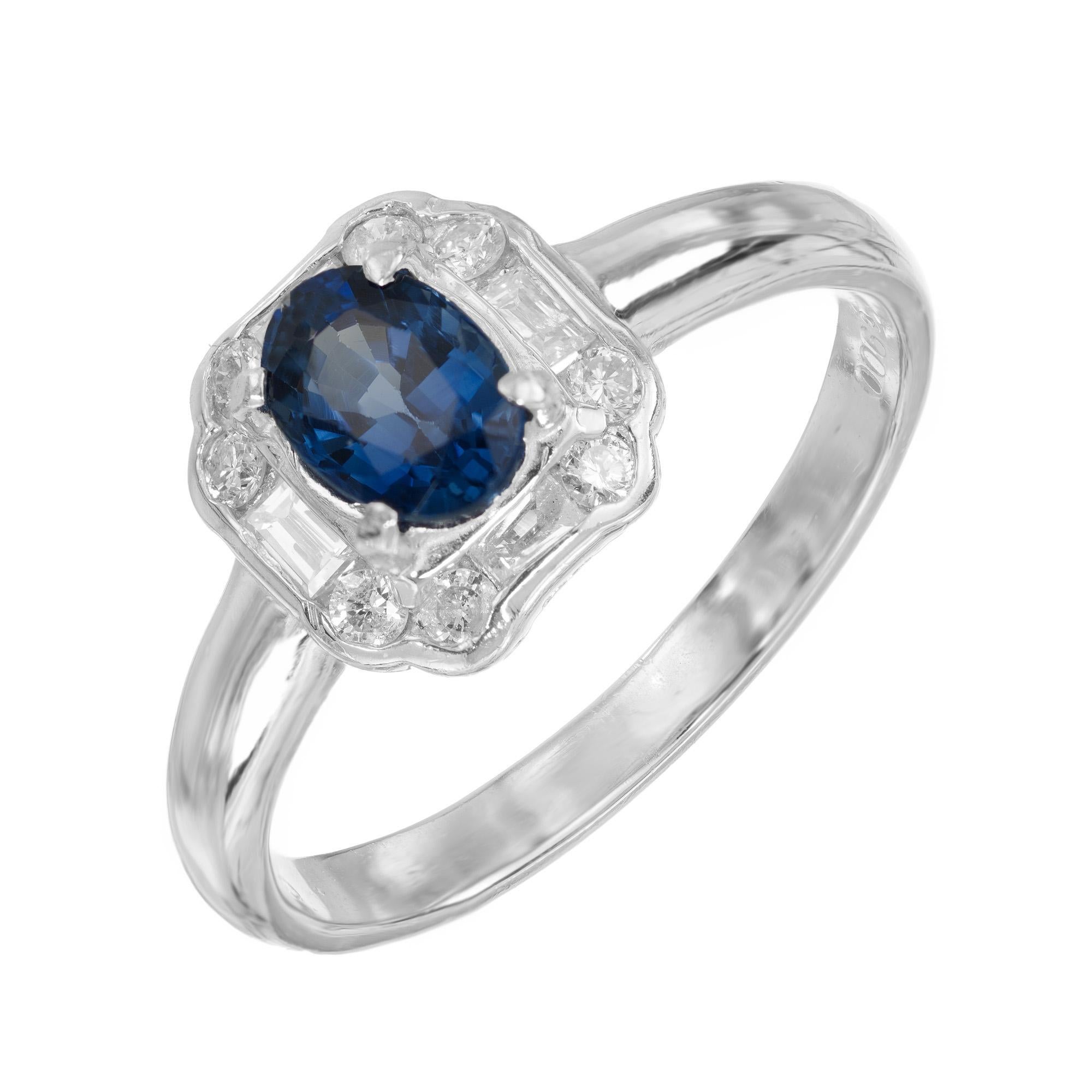 1940’s Retro Deco Style bright Ceylon  Sapphire and diamond engagement ring.  .80ct oval sapphire center stone, mounted in a platinum setting accented by 8 round cut diamonds. The striking contrast between the deep blue hue of the sapphire and the