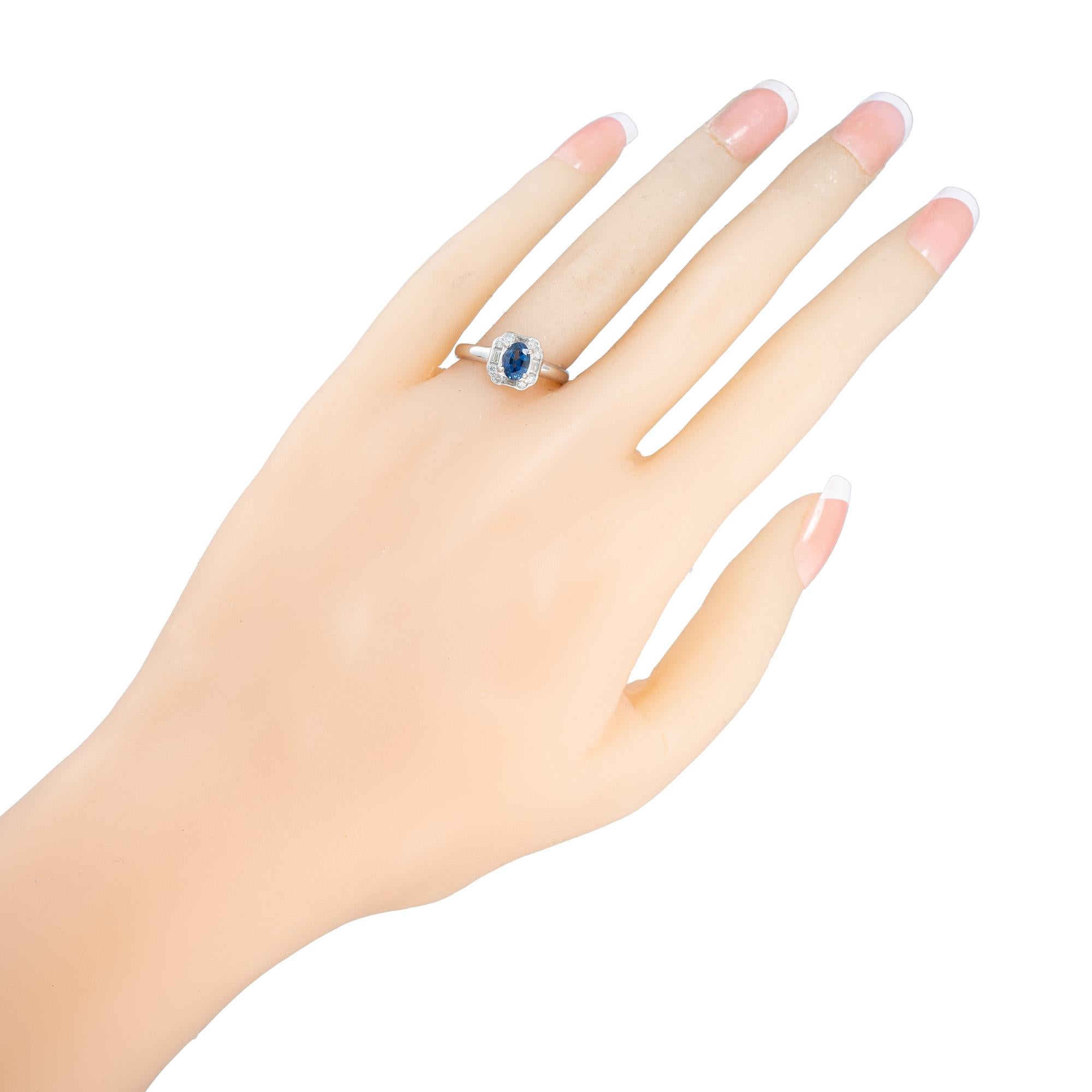 Women's .80 Carat Oval Ceylon Sapphire Round Diamond Platinum Engagement Ring For Sale