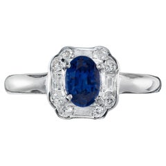 Antique .80 Carat Oval Ceylon Sapphire Round Diamond Platinum Engagement Ring