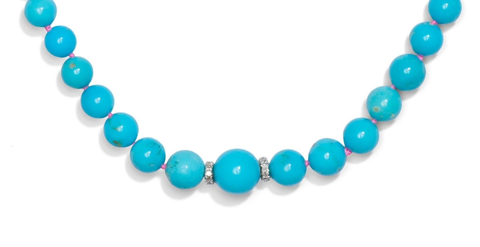 alluring round sky blue turquoise beads, hand-knotted on luxurious silk and dazzlingly framed with white sparkling diamonds — all cinched together with a regal 14k gold clasp! This necklace is composed of pure natural Sleeping Beuty