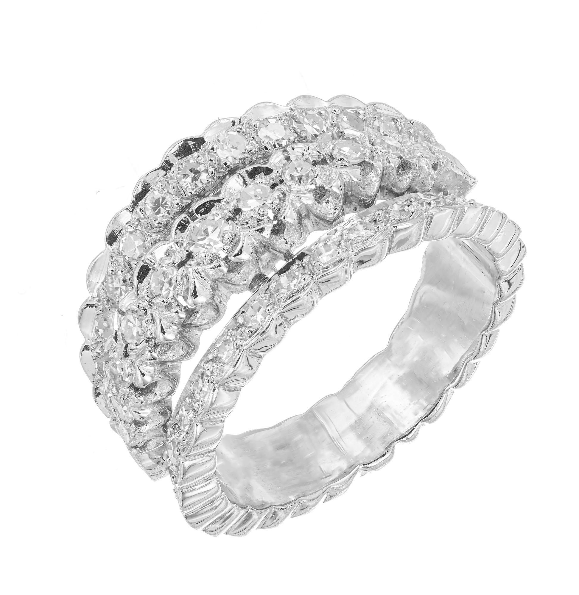 1940's diamond cocktail ring. 37 single cut diamonds in tapered 14k white gold setting. Scalloped open work top with 3 rows of single cut diamonds.

37 single cut diamonds, approx. total weight .80cts, G, VS
Size 7.5 and sizable
14k White
