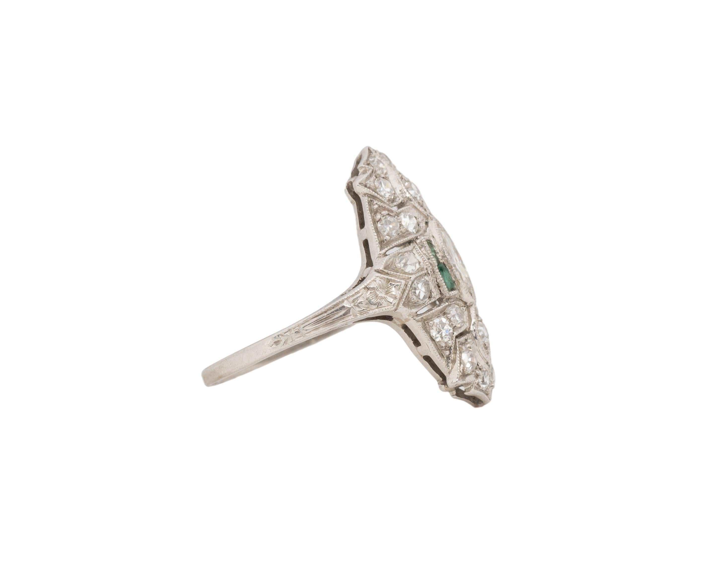 Ring Size: 6.25
Metal Type: Platinum [Hallmarked, and Tested]
Weight: 4.0grams

Diamond Details:
Weight: .80ct, total weight
Cut: Antique Marquise & Old European brilliant
Color: F-G
Clarity: VS

Emerald Details:
Weight: .20ct, total
Color: