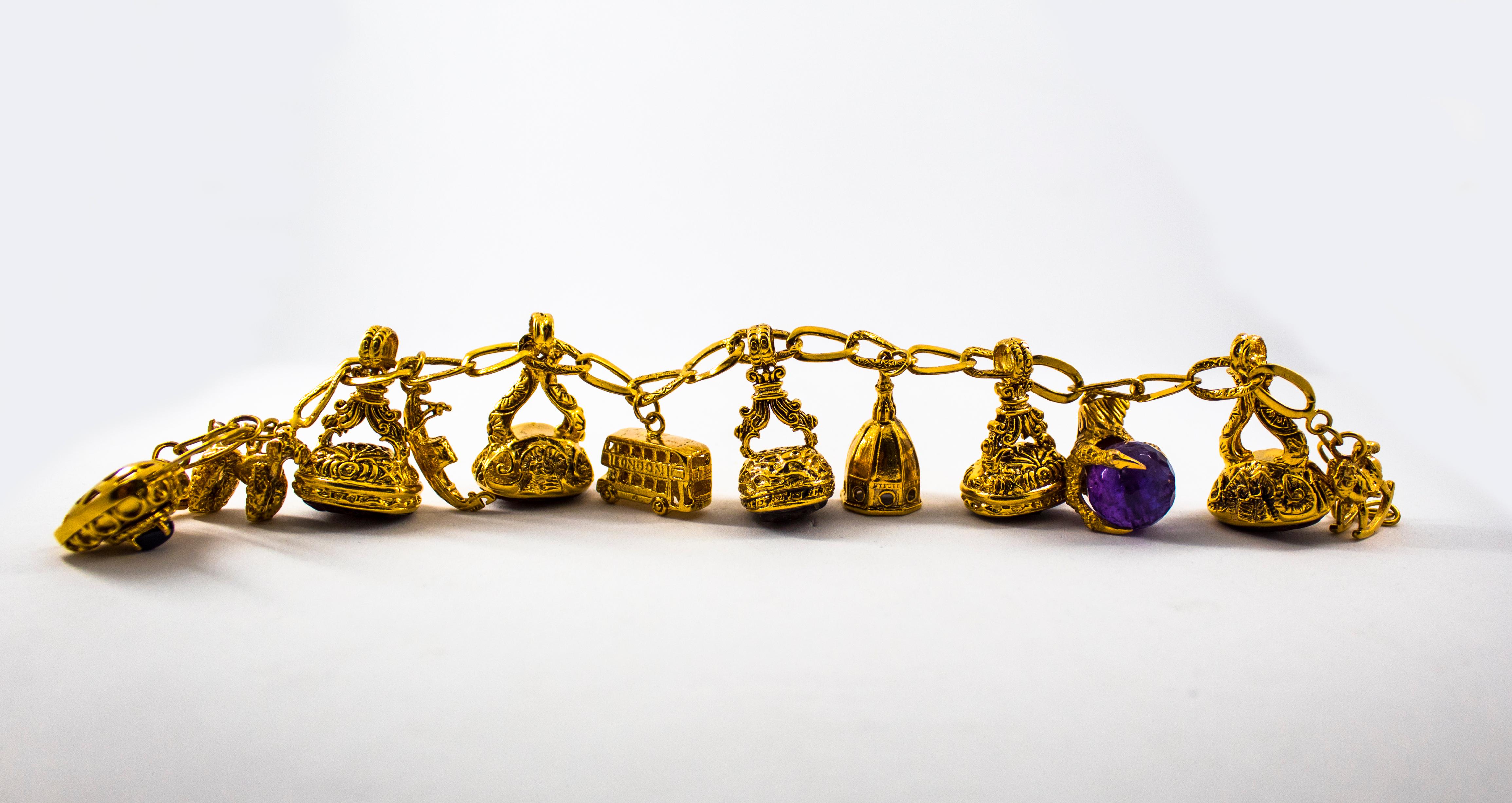 This Charm Bracelet is made of 9K Yellow Gold.
This Bracelet has a 0.50 Carats Blue Sapphire.
This Bracelet has also Carnelian.
This Bracelet has an 8.00 Carats Amethyst.
We're a workshop so every piece is handmade, customizable and resizable.