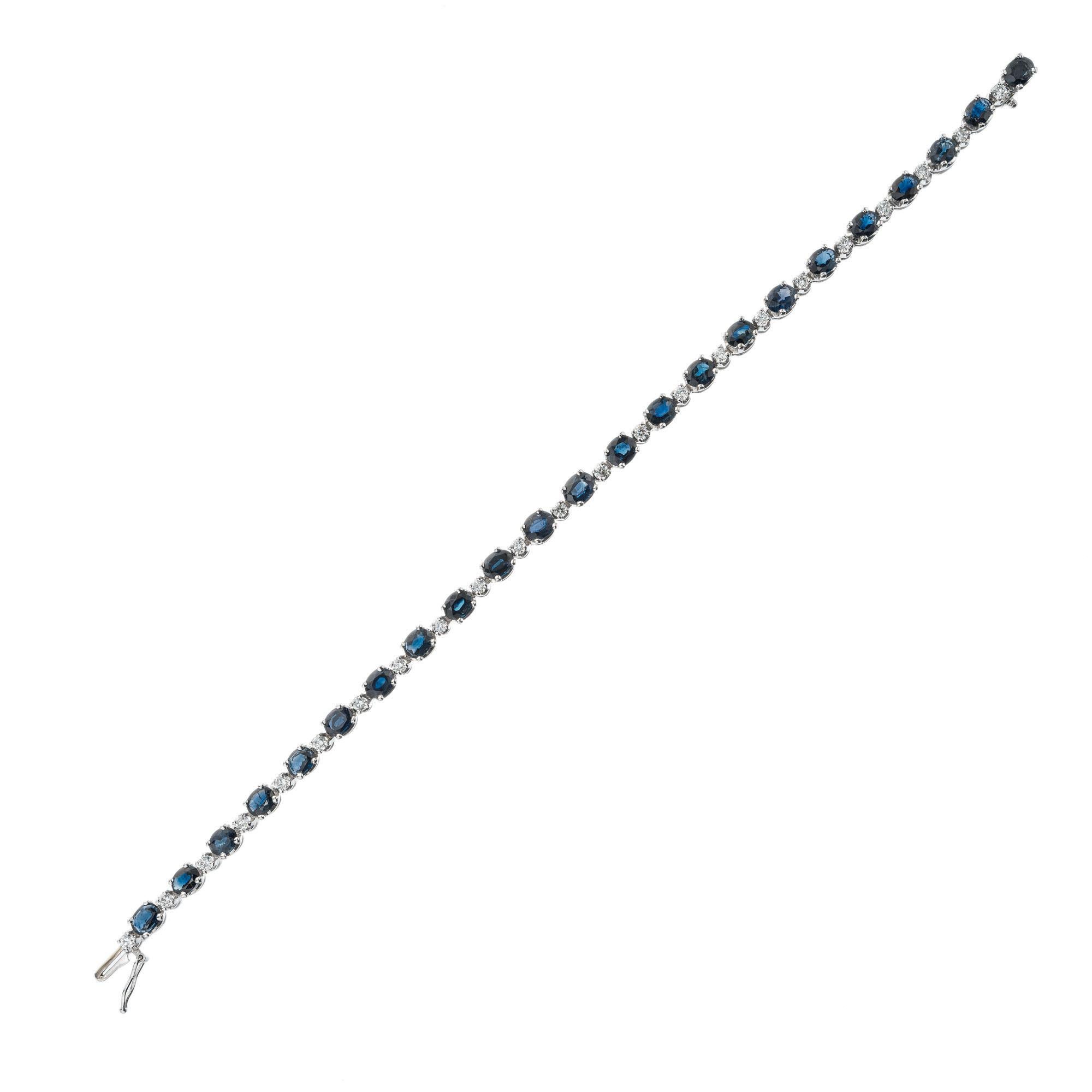 Sapphire and diamond bracelet. 23 oval sapphires, seperated by 23 round brilliant cut diamonds in 18k white gold. Built in catch. Side lock safety. 7.5 inches. 

23 oval blue sapphires, approx. 8.00cts
23 round brilliant cut diamonds, G-H VS approx.