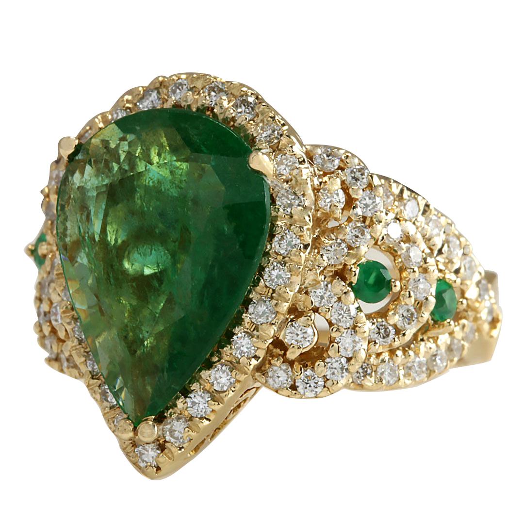 Immerse yourself in the mesmerizing allure of this Emerald Diamond Ring, a true testament to timeless elegance and luxury. Crafted in radiant 14K Yellow Gold and weighing a substantial 9.7 grams, this ring boasts a remarkable 8.00 carats of