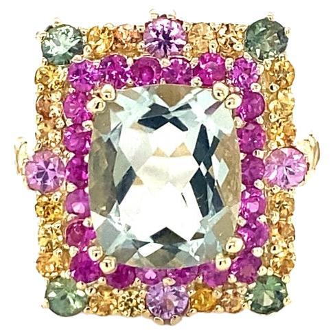 Bague cocktail en or jaune 8,00 carats améthyste verte naturelle et saphirs

Cette bague est ornée au centre d'une améthyste verte subtile mais attirante. L'améthyste est rehaussée de saphirs multicolores naturels sertis dans une combinaison de