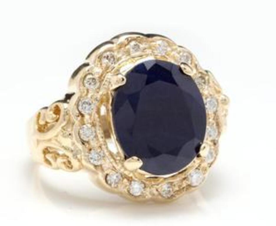 8.00 Carats Exquisite Natural Blue Sapphire and Diamond 14K Solid Yellow Gold Ring

Total Natural Blue Sapphire Weights: Approx. 7.50 Carats

Sapphire Measures: Approx. 12.00 x 10.00mm

Sapphire Treatment: Diffusion

Natural Round Diamonds Weight: