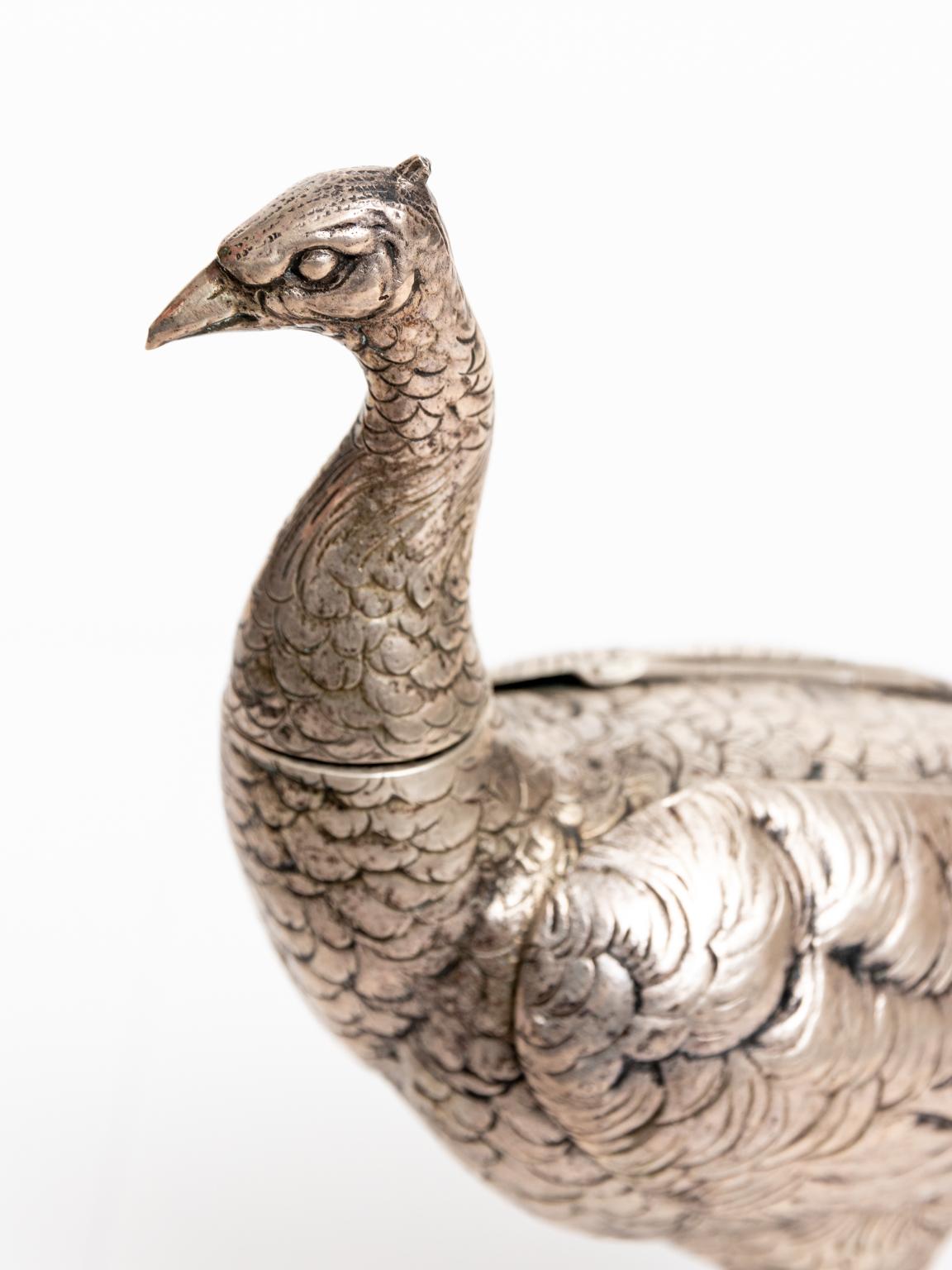 Circa early 20th century marked 800 silver German pheasant spice container with wings that spread. It is a complete piece and weighs 231.2 Grams. The spices are poured out from a dispenser in the removable head. Made in Germany. Please note of wear