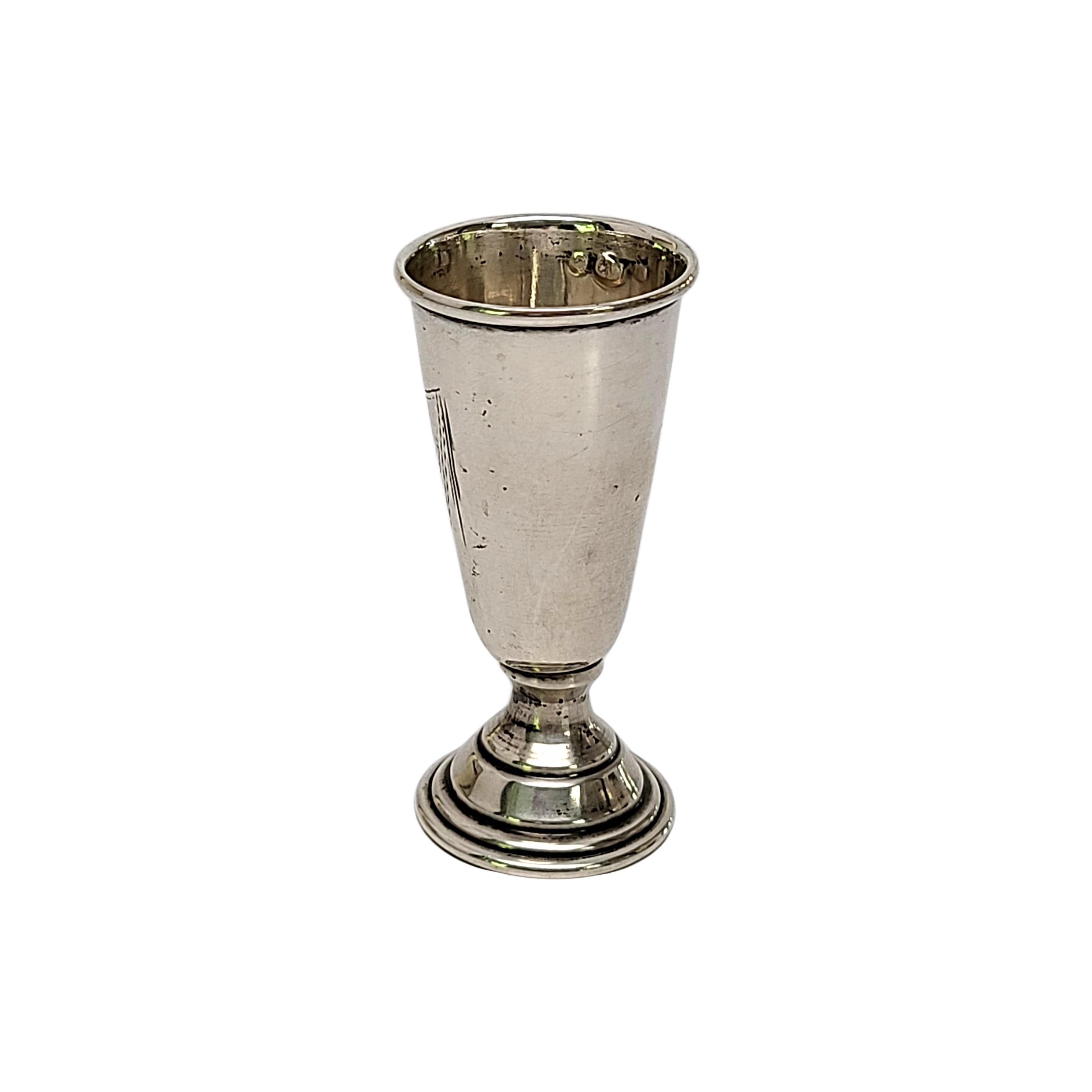 800 silver kiddush cup or shot glass.

Small cup with etched shield and engraved with Hebrew letters.

Measures 2 1/2