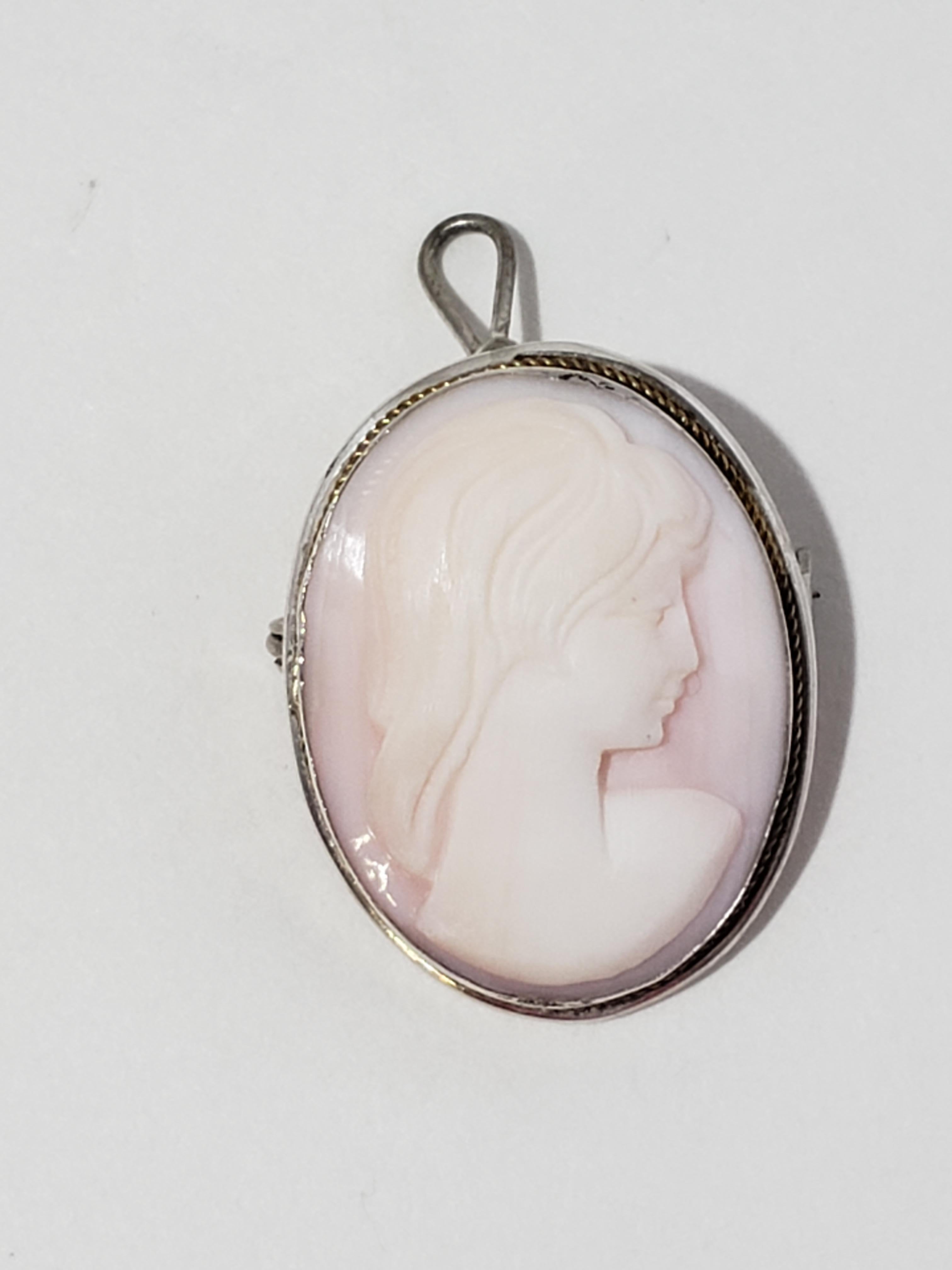 800 Sterling Silver Shell Cameo Brooch Pendant

Beautifully detailed hand carved shell cameo with a lovely woman's face. The silver frame has a simple setting that gives it style. Brooch backs as well as pendant, so it is very versatile.
