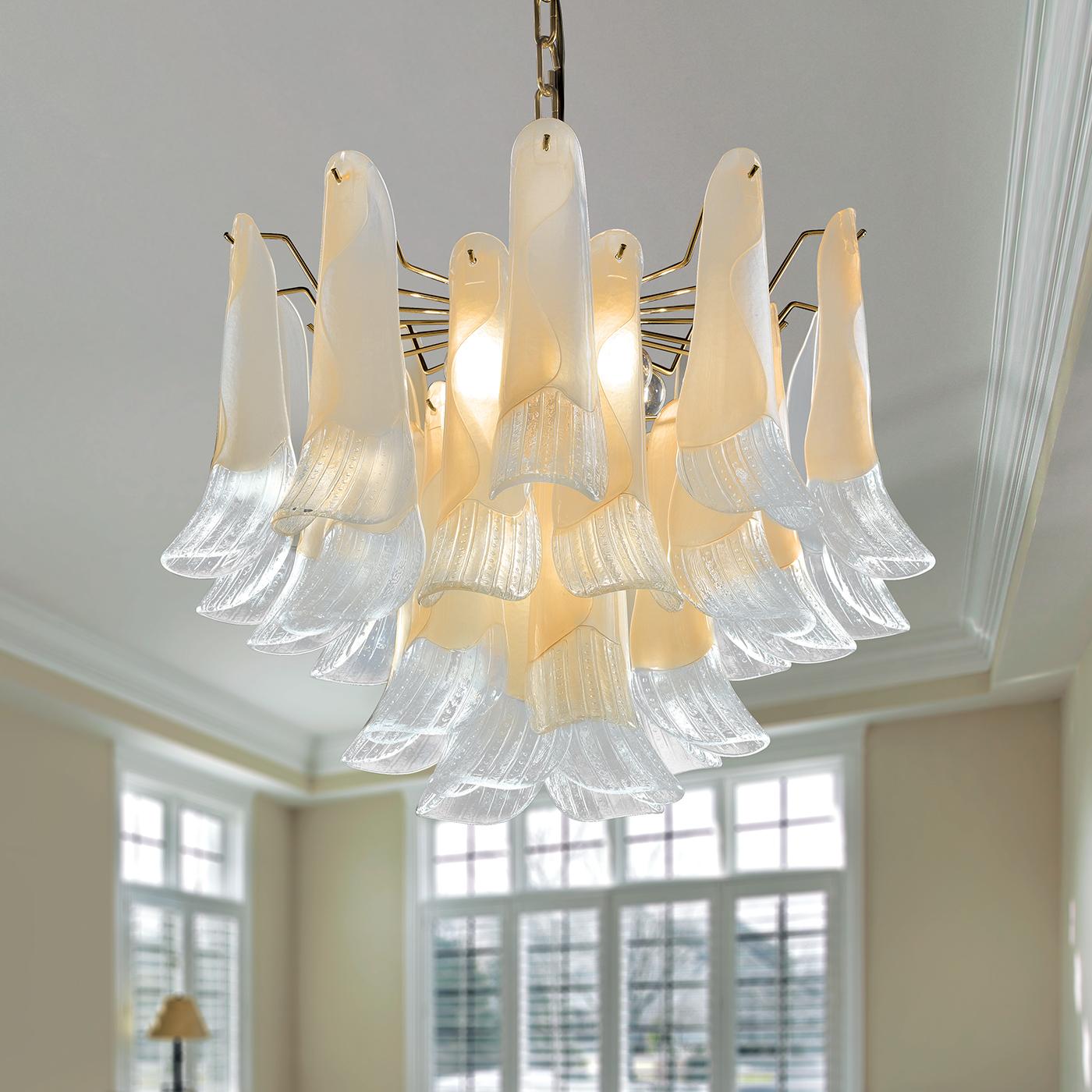 Just like a display of Calla Lillies suspended from the ceiling, this fabulous Chandelier brings a fresh and exuberant element to the room. Featuring 9 elegant lamps crafted in white, pink or amber glass, this stunning lighting fixture has a