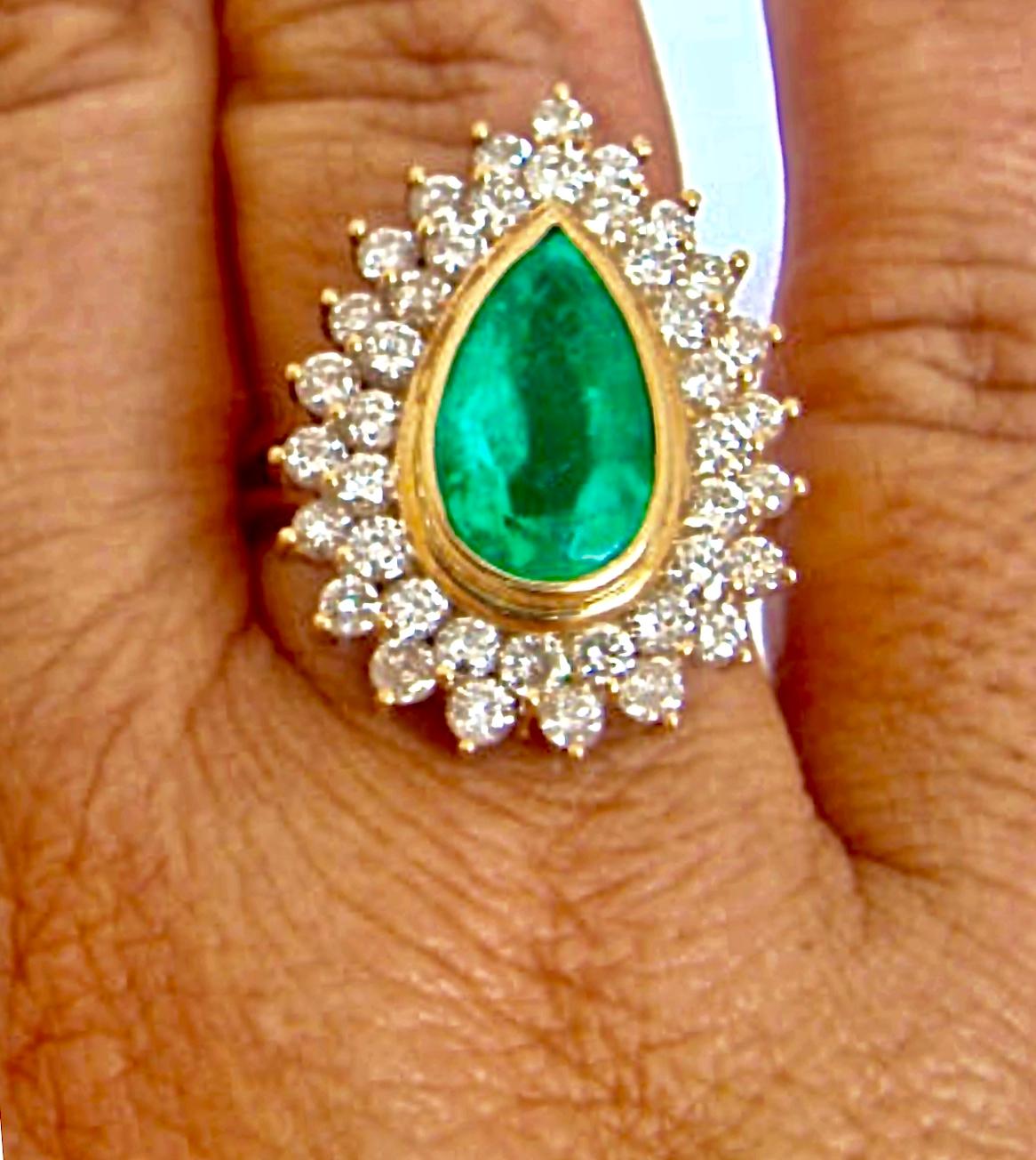This is a fine natural Colombian emerald pear cut weighing 6.00 carats, vivid medium green color, excellent clarity, and transparency. Second stone, natural round brilliant cut diamonds weighing approx. 2.00 carats, clarity SI1-SI2 / color H-G
Total